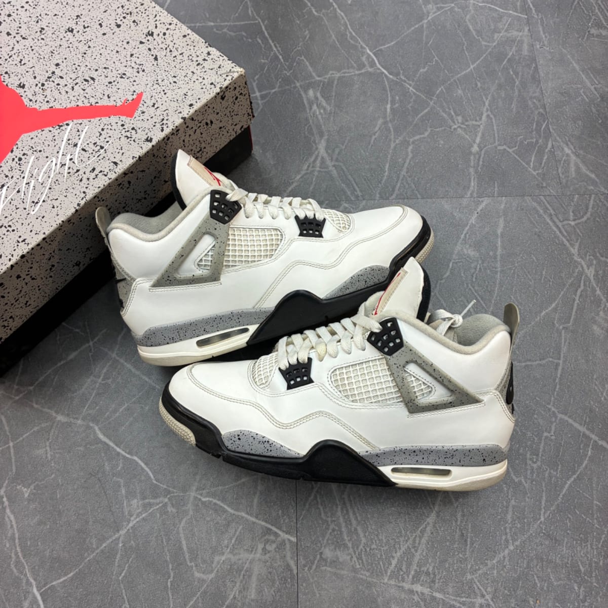 Jordan 4 Retro White Cement (2025) (Size 11) (Moderately Worn) - front