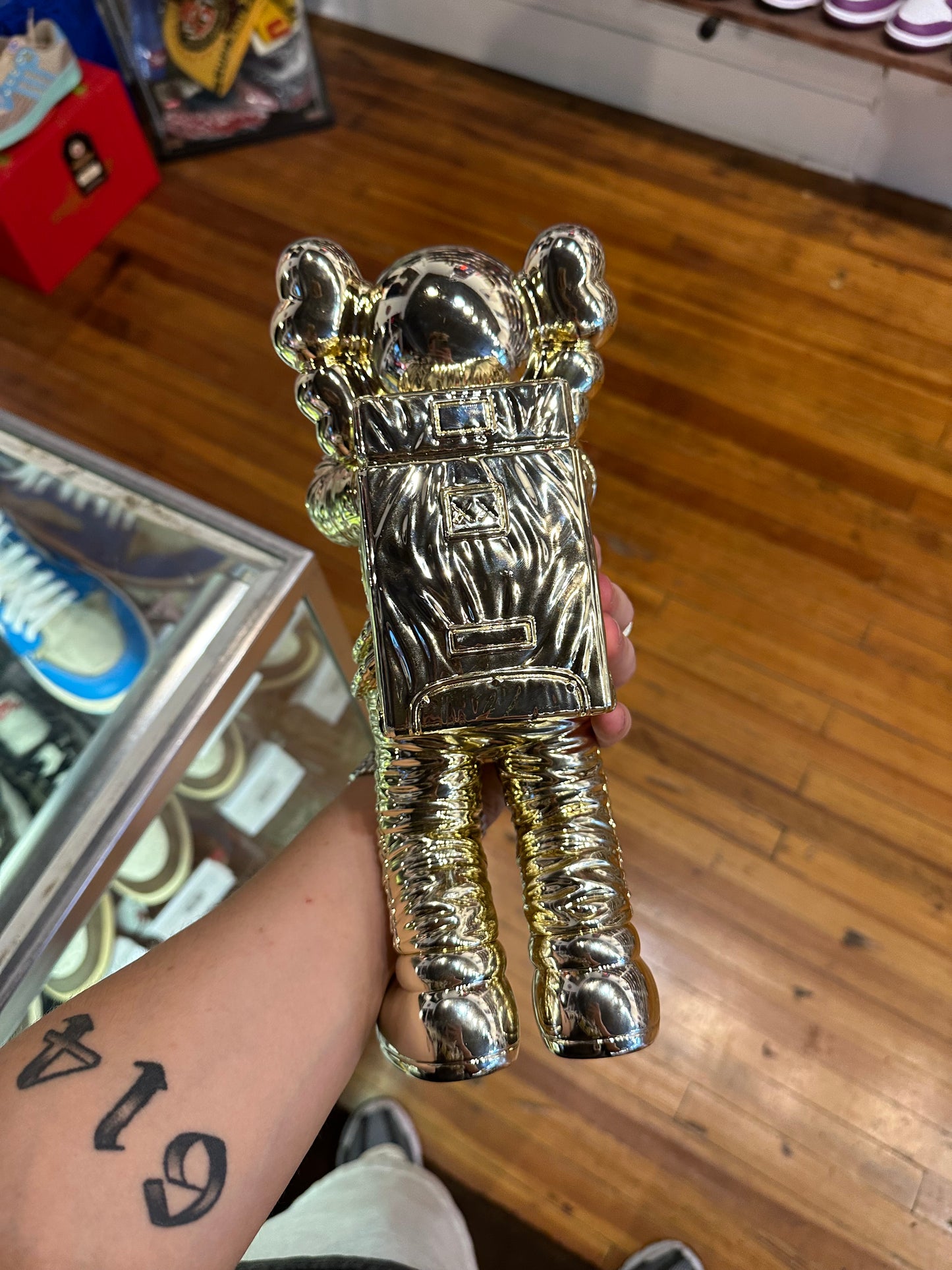 KAWS Holiday Space Figure “Gold”