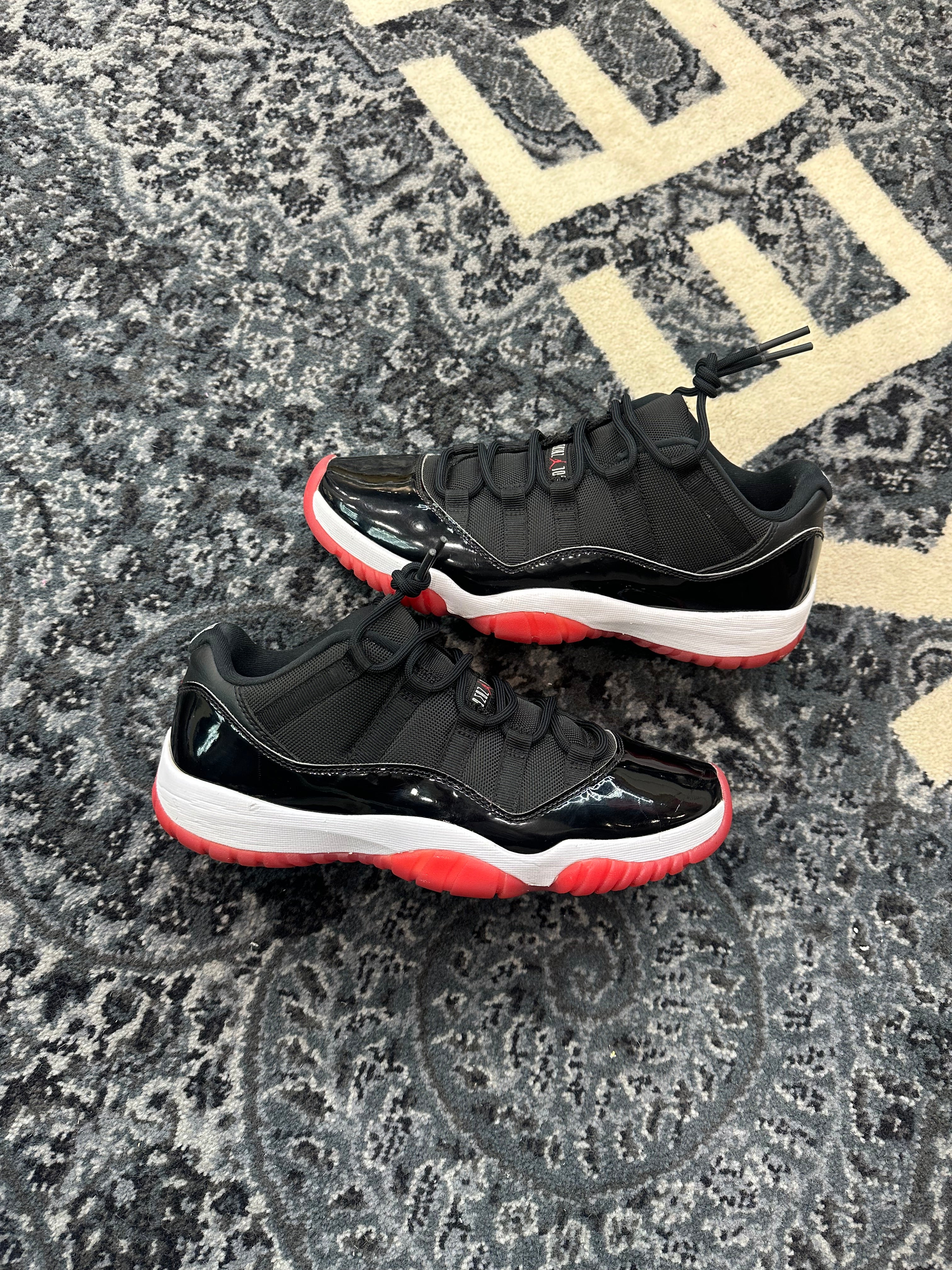 Jordan 11 Low “Bred”