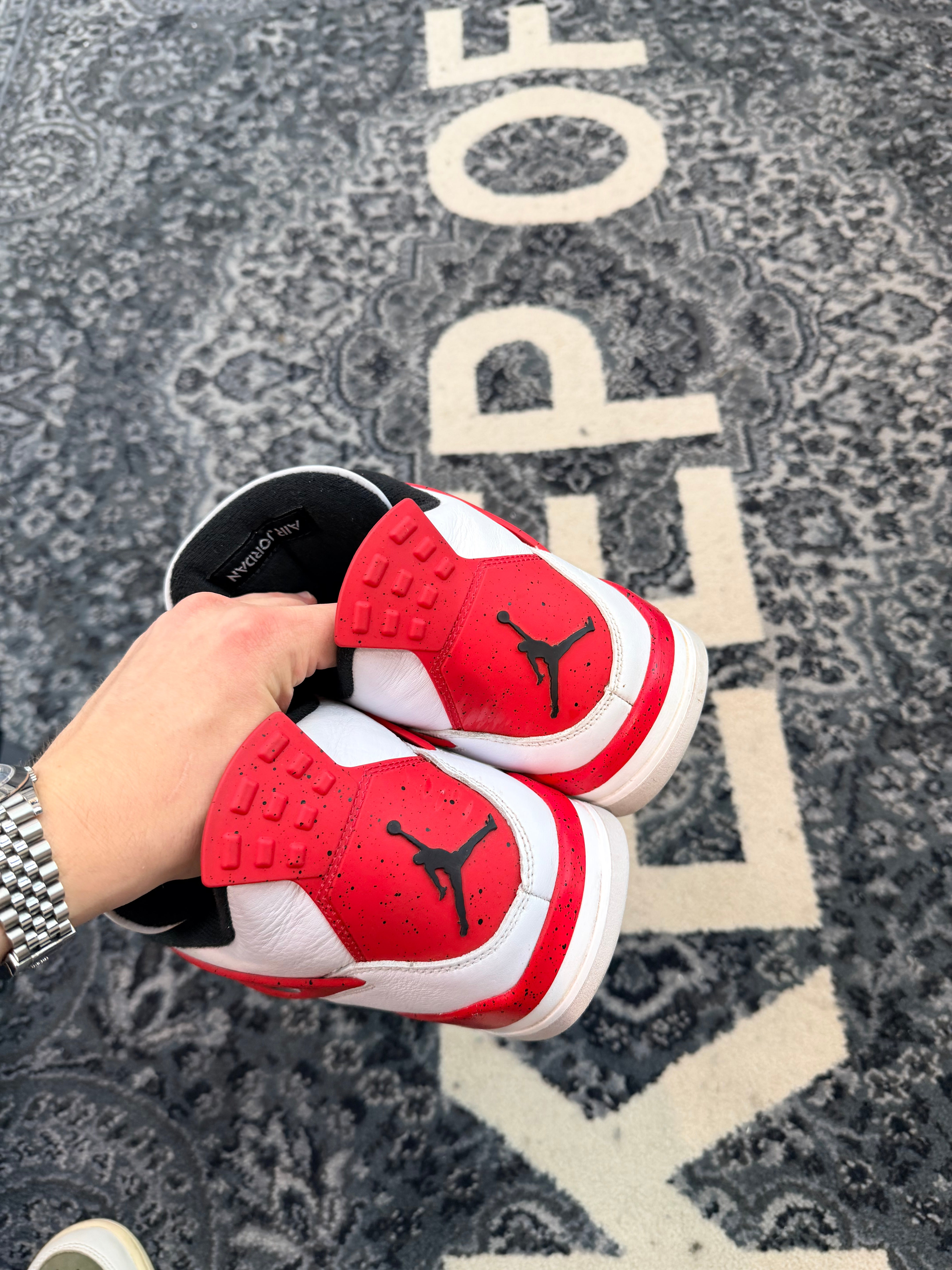Jordan 4 “Red Cement”