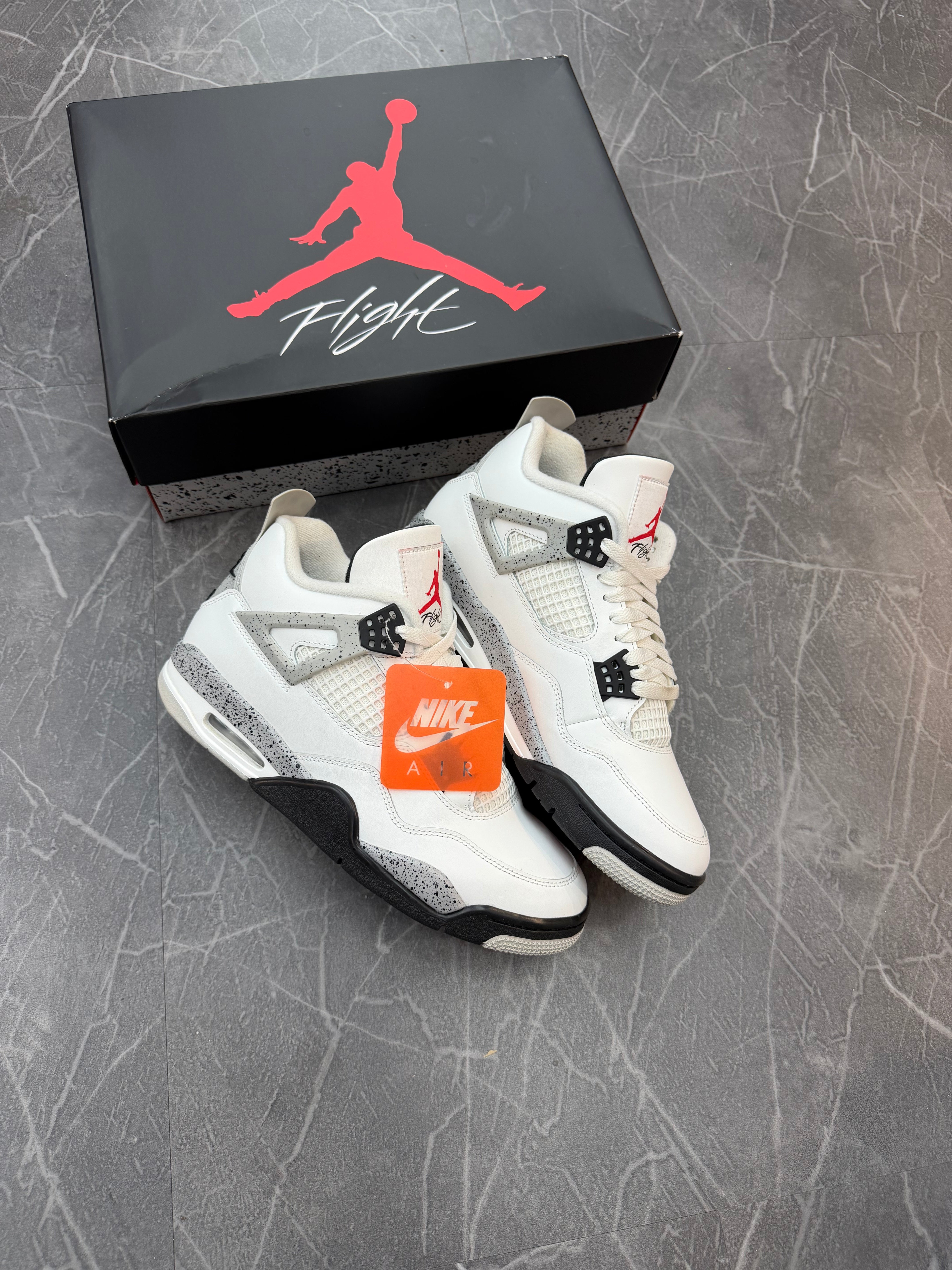 Jordan 4 “White Cement”