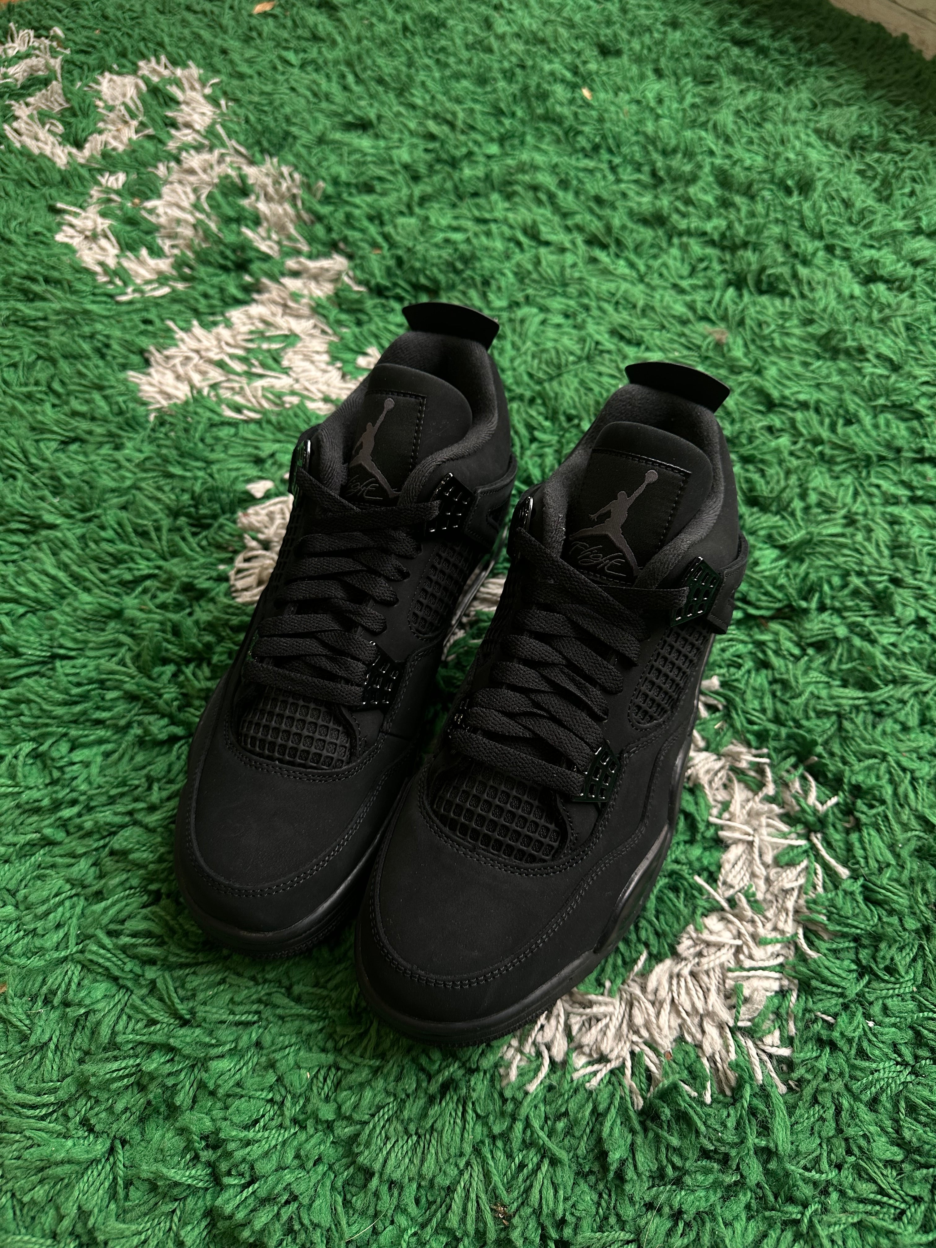 Jordan 4 “Black Cat” (2025)