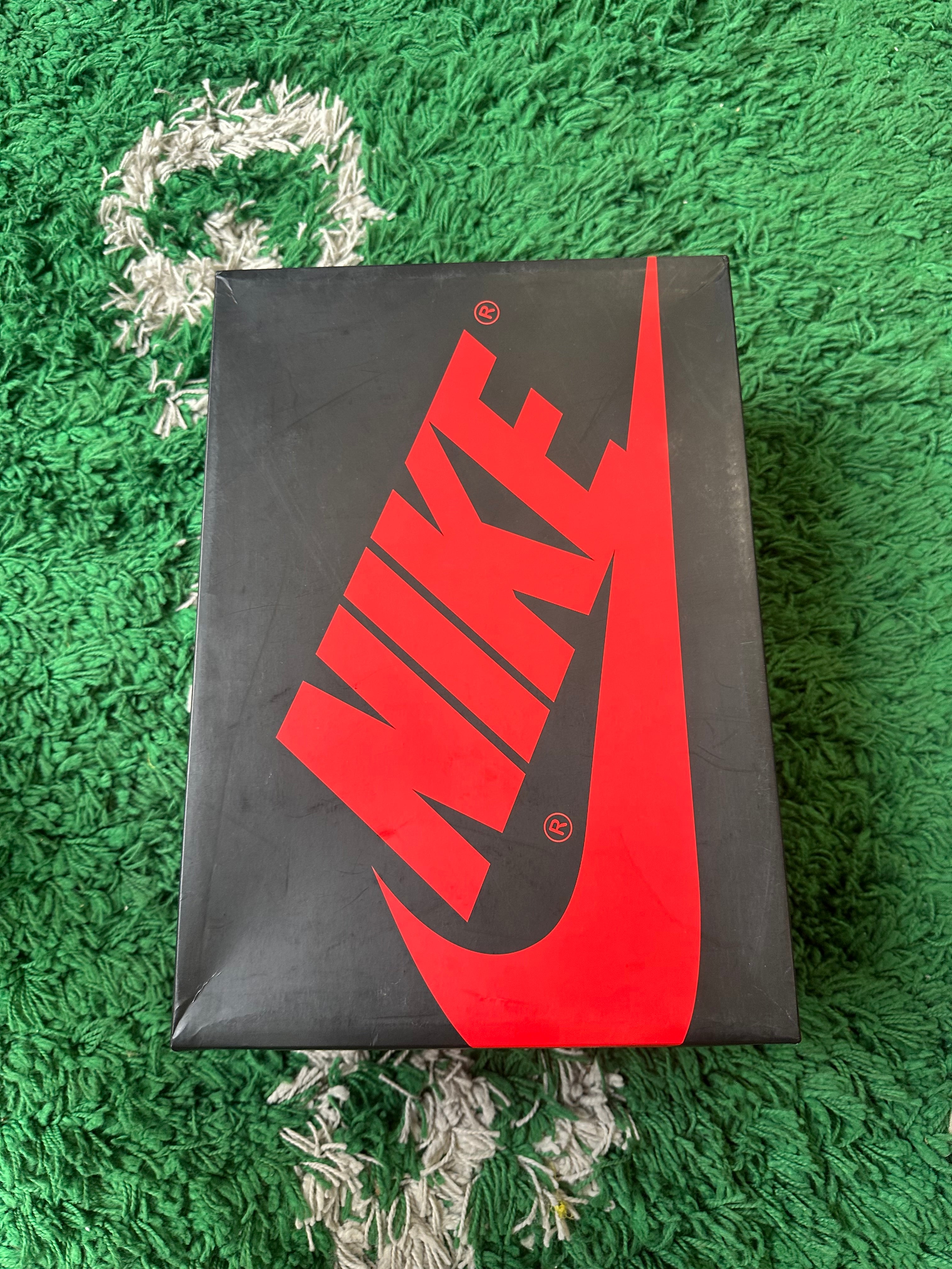 Jordan 1 “Black Crimson Tint”