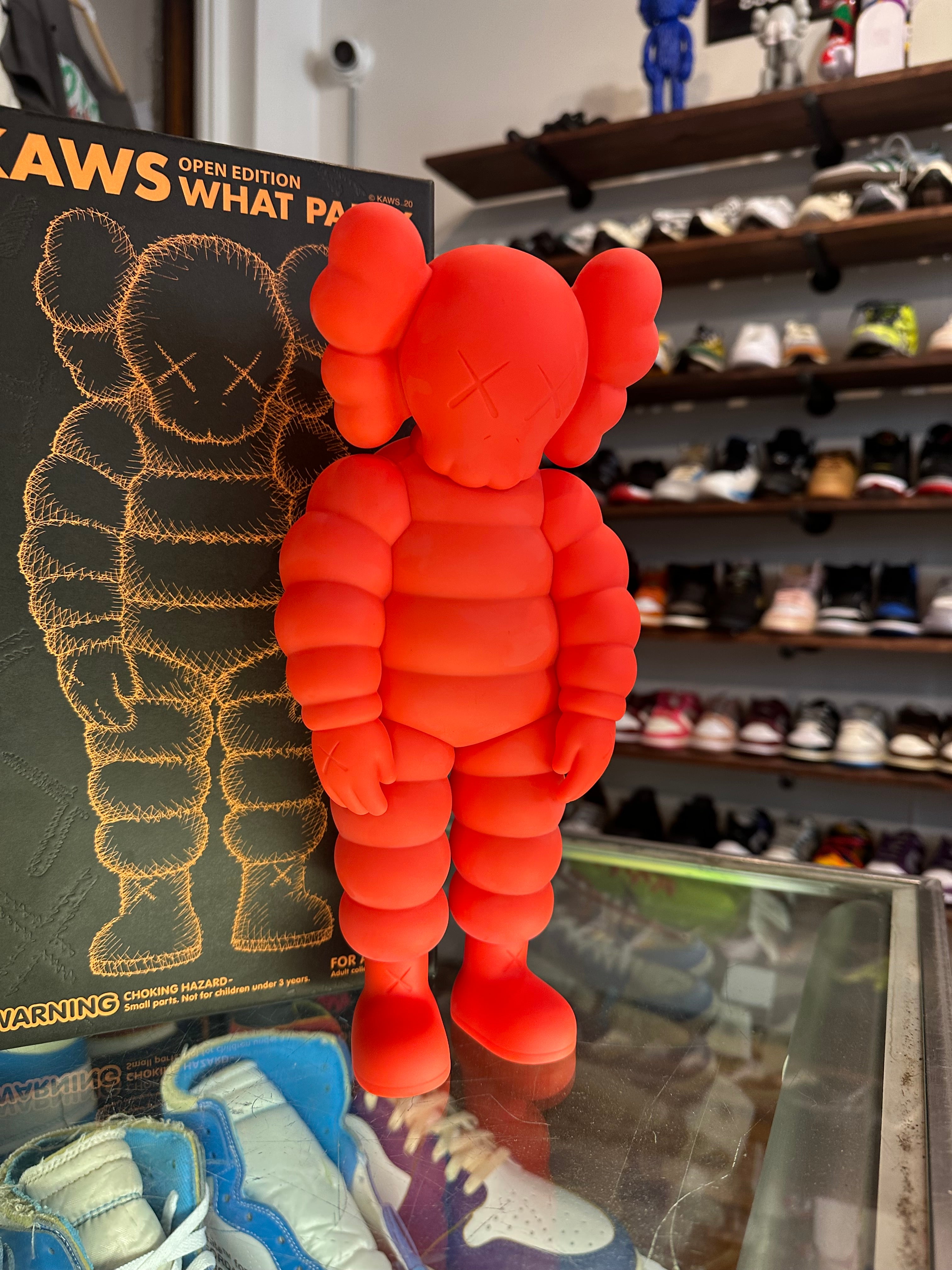 KAWS What Party Vinyl Figure “Orange”