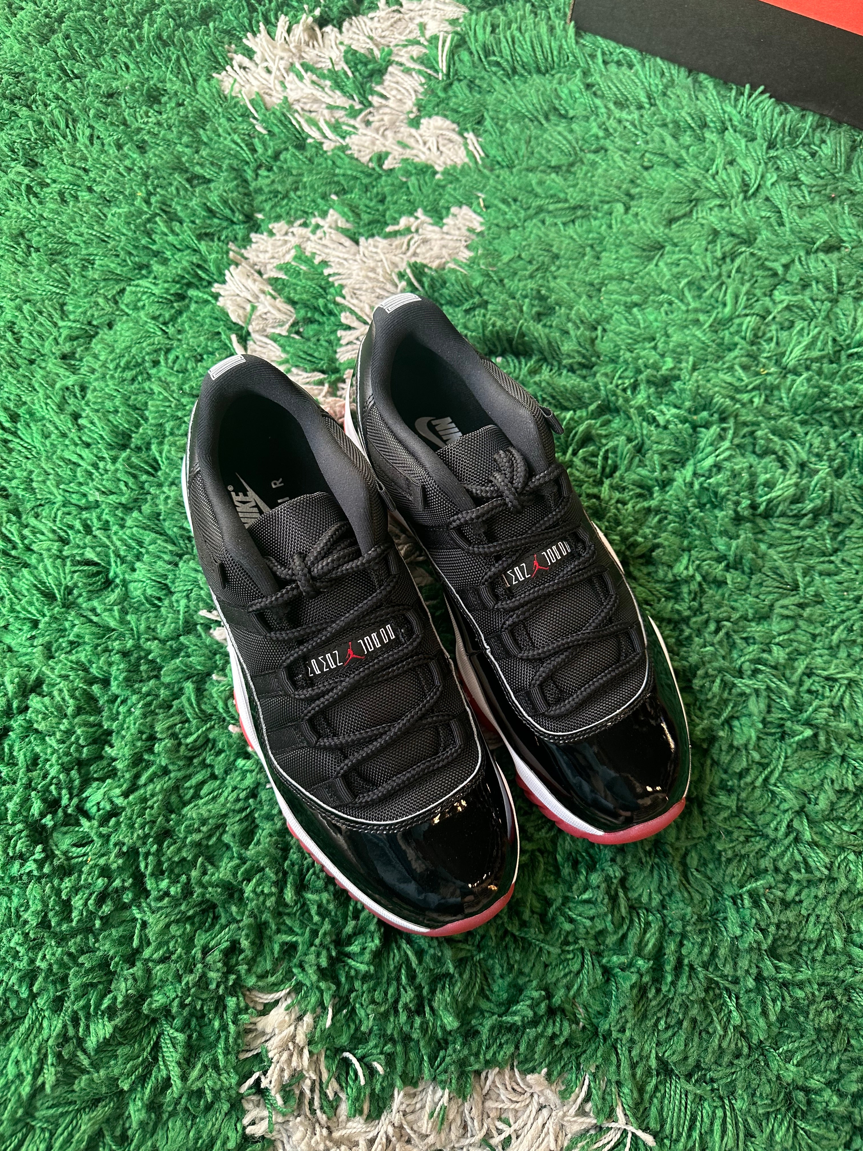 Jordan 11 Low “Bred” (2025)