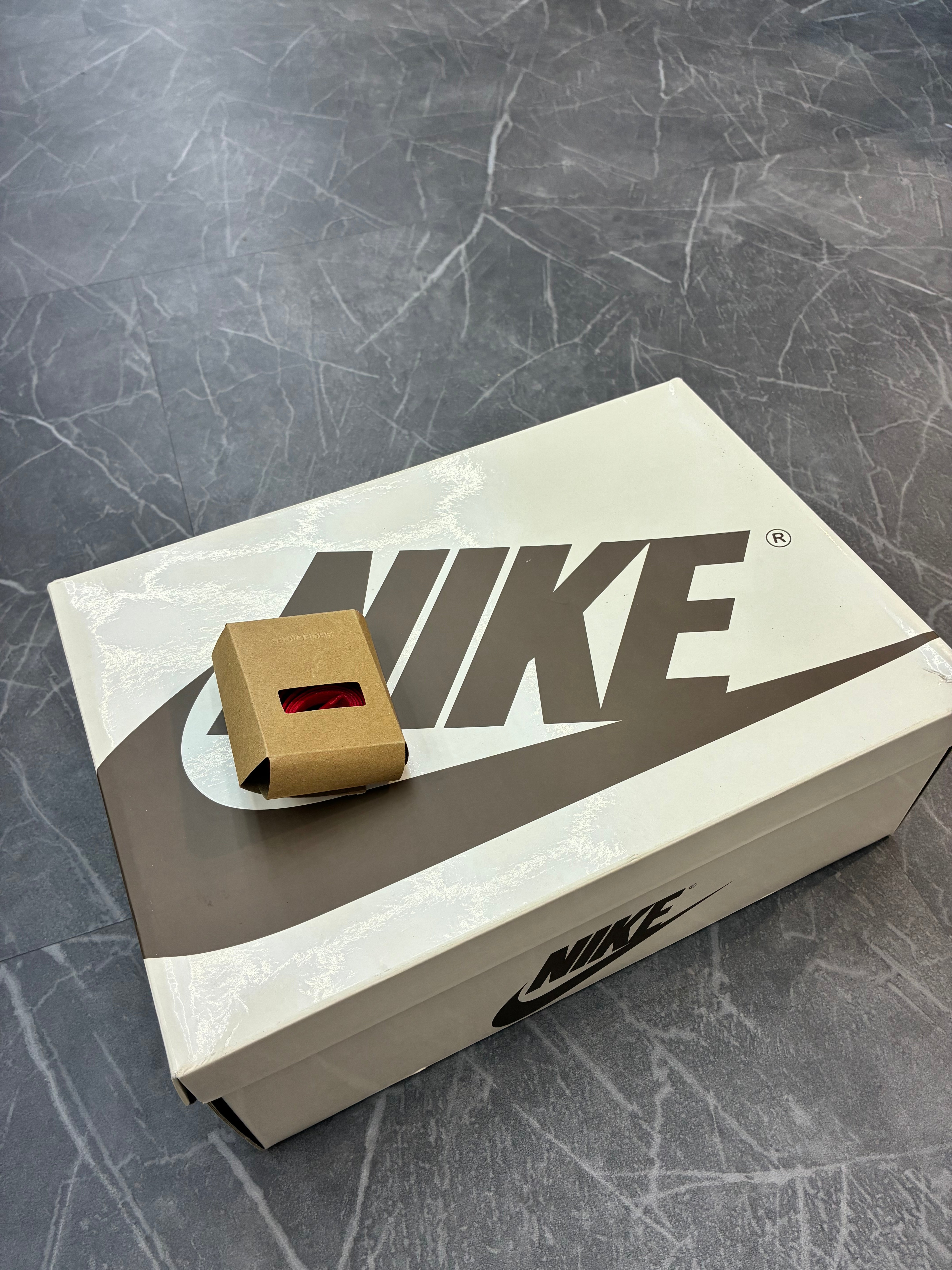 Travis Scott Jordan 1 Low “Canary”