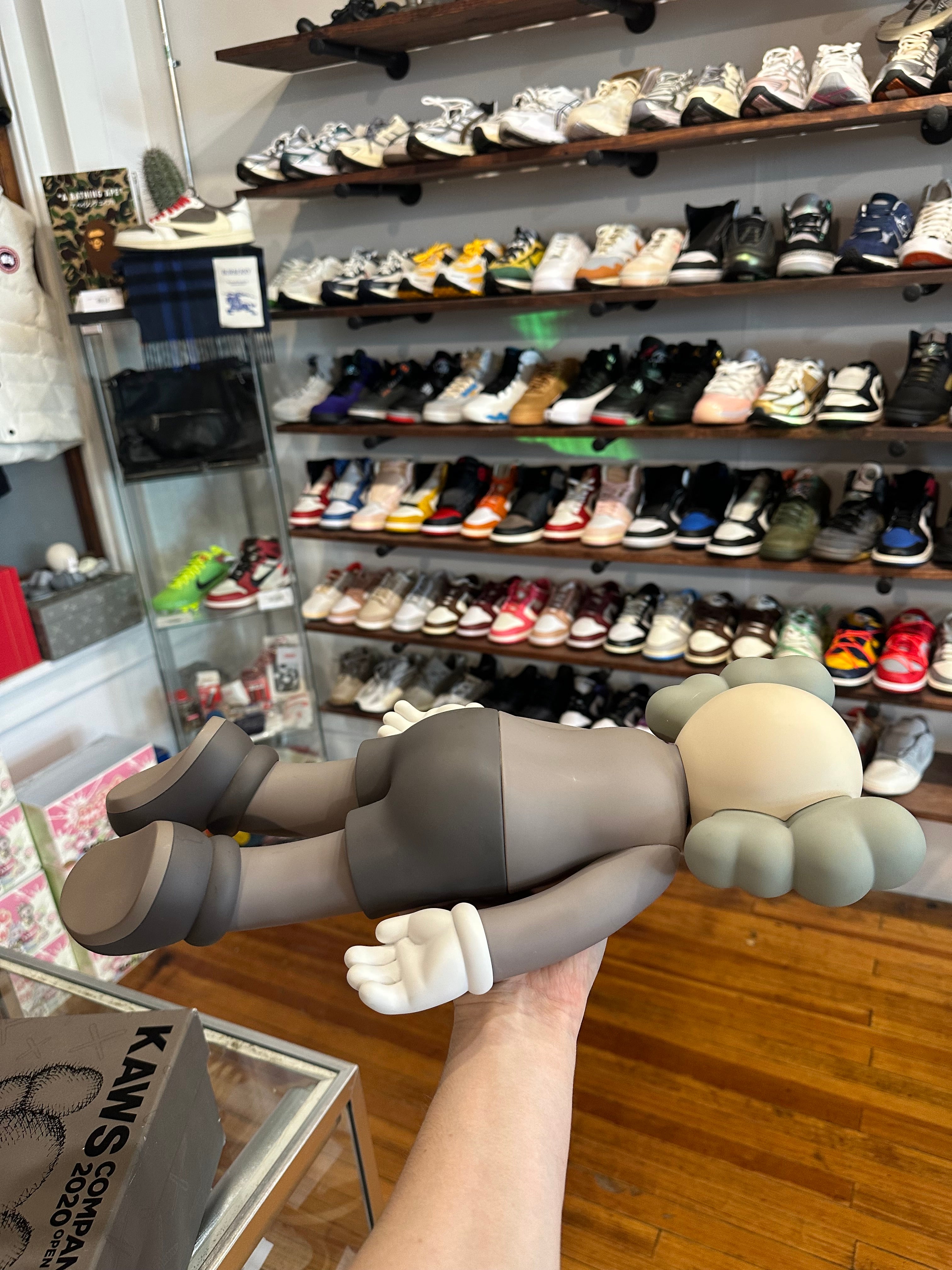 KAWS 2020 Vinyl Figure “Laying Down Brown”