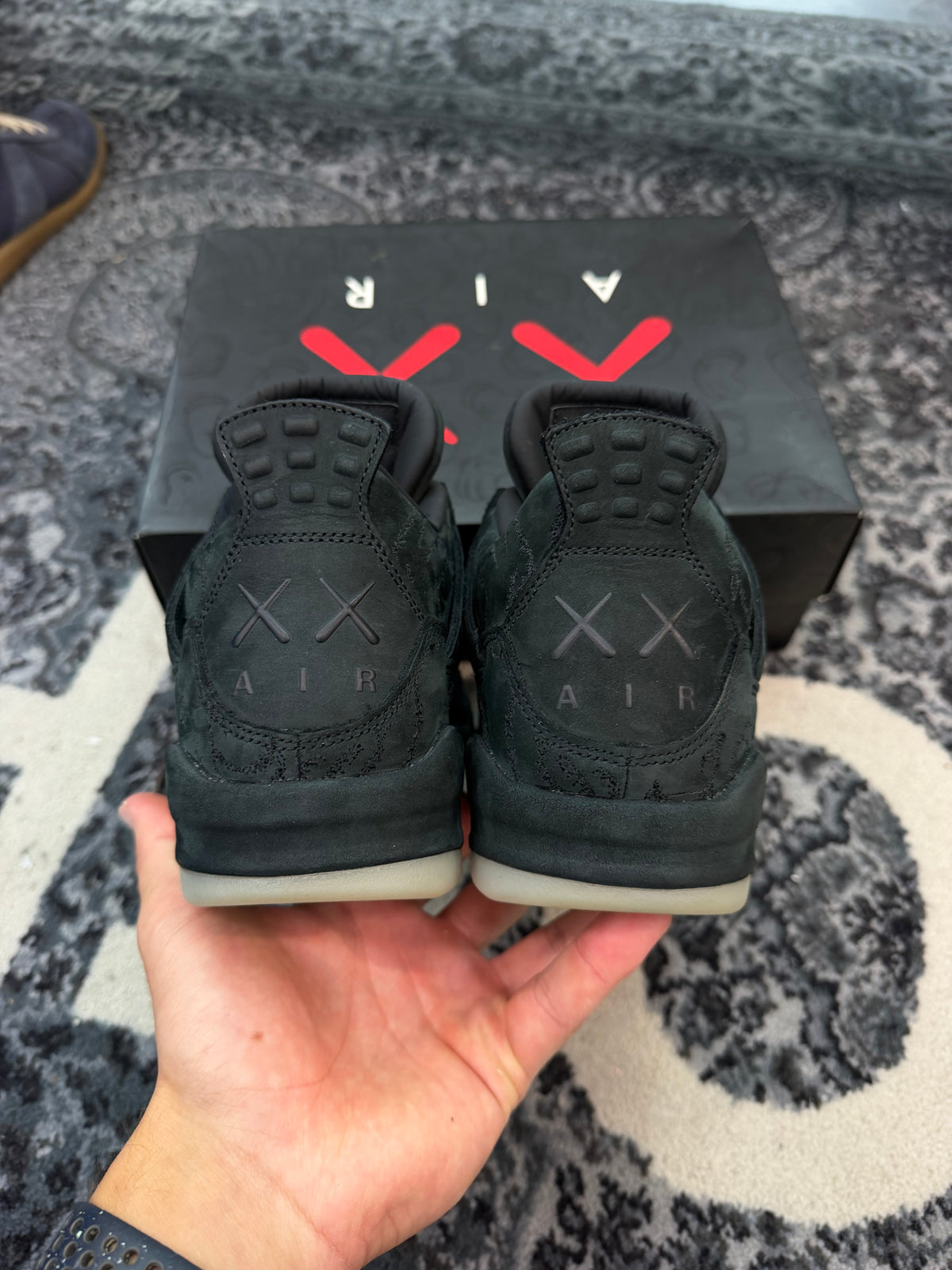 Jordan 4 x Kaws “Black”