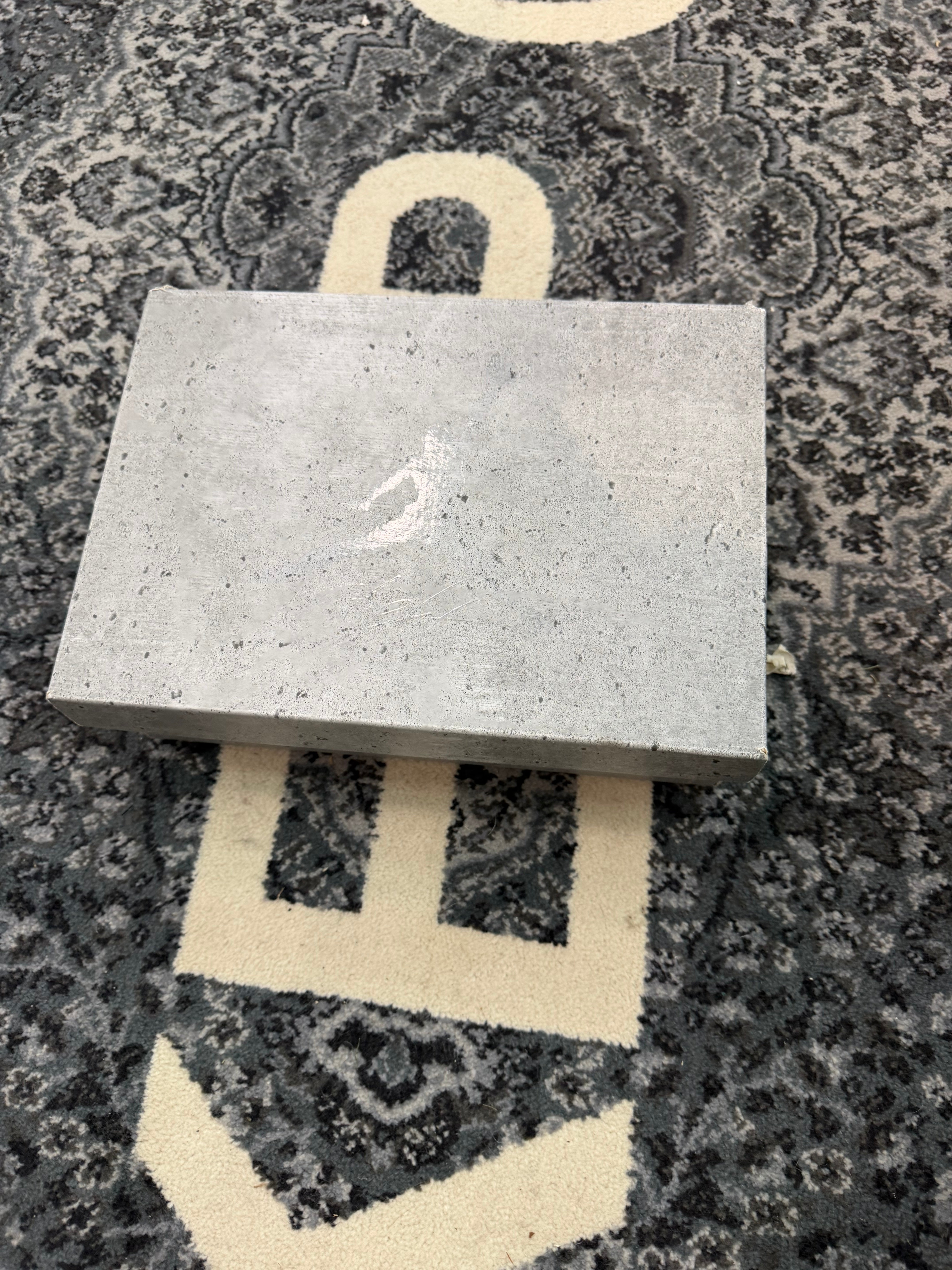 Jordan 4 “Wet Cement”