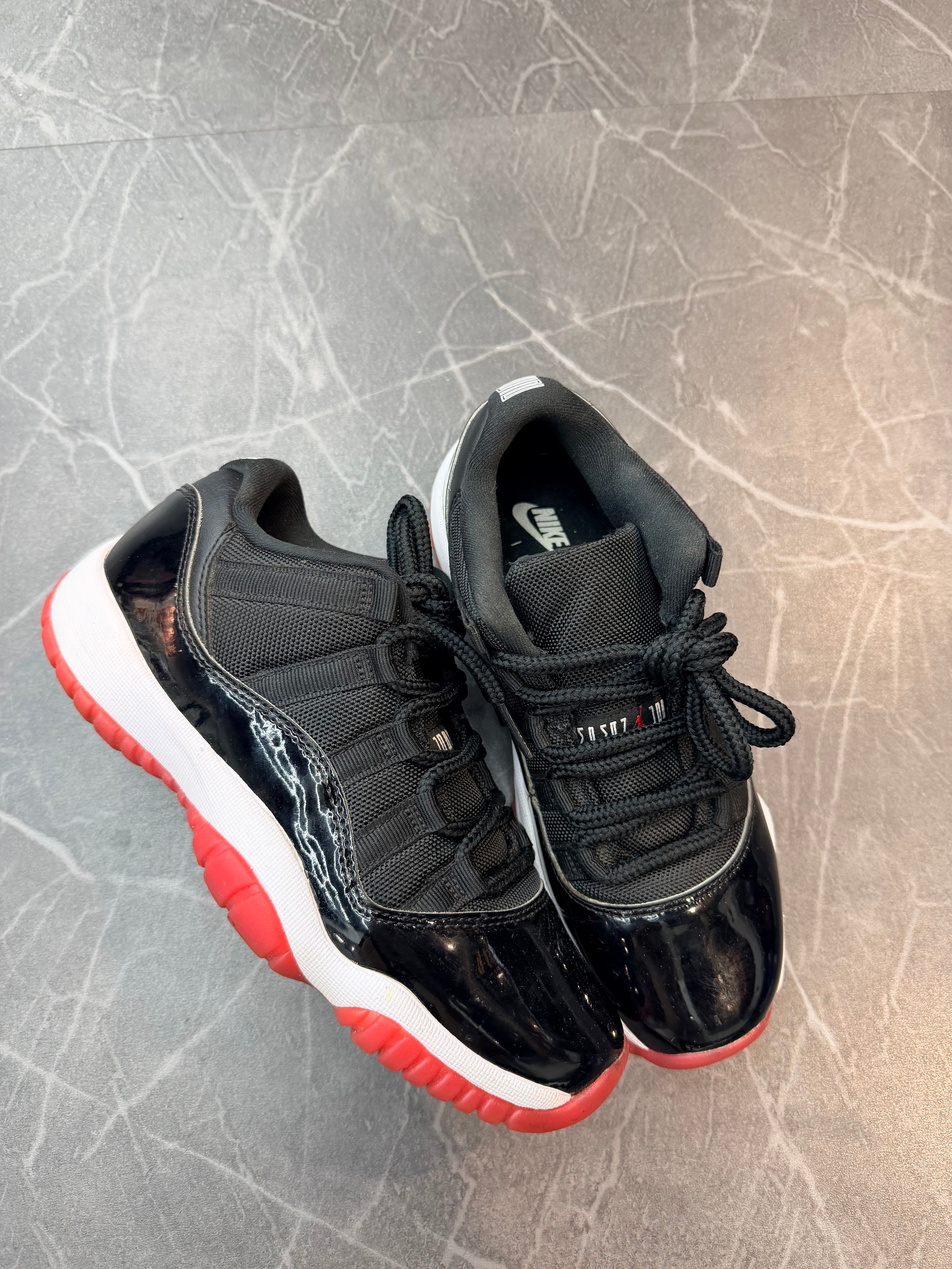 Jordan 11 Low “Bred”