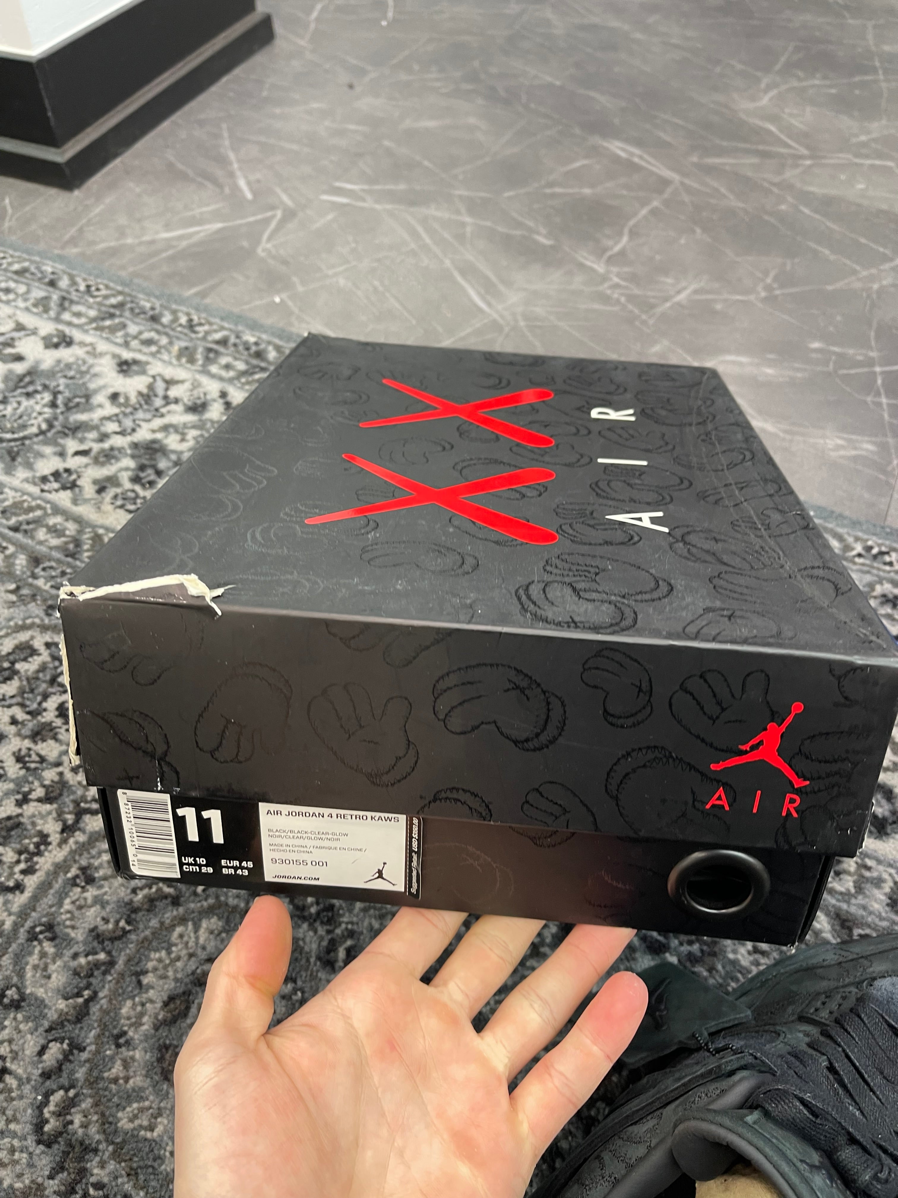 Jordan 4 x Kaws “Black”