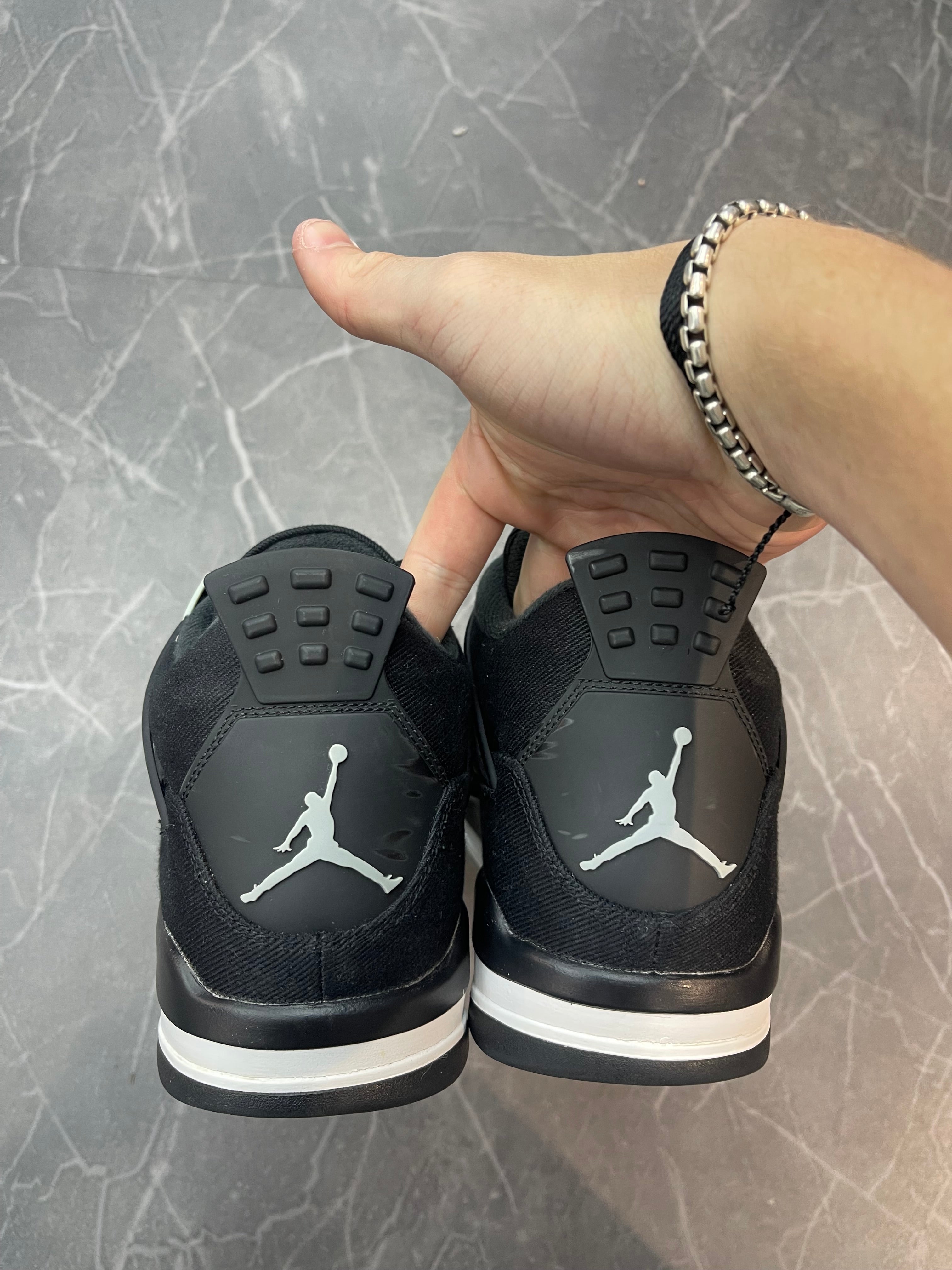 Jordan 4 “Black Canvas”