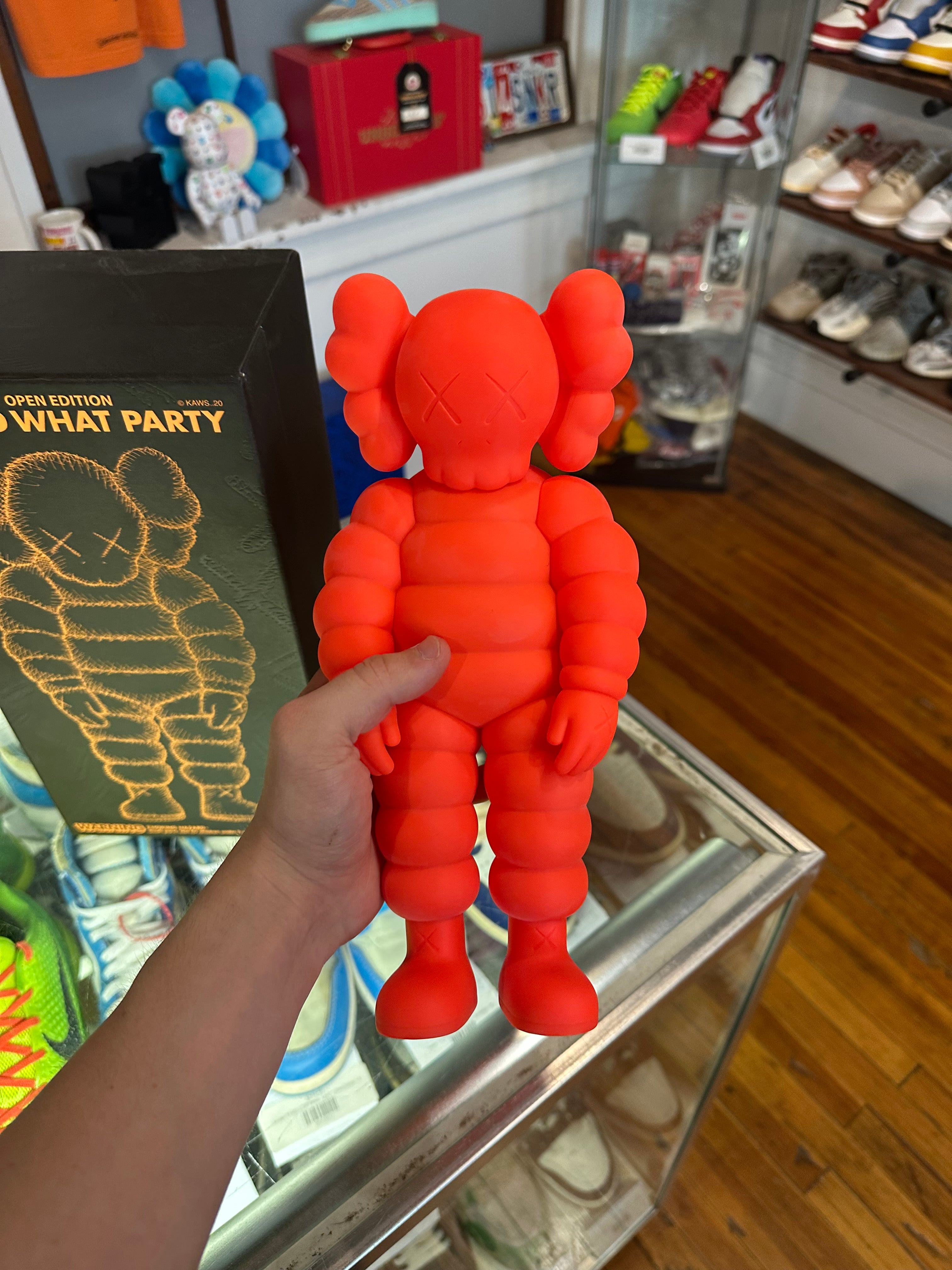 KAWS What Party Vinyl Figure “Orange”