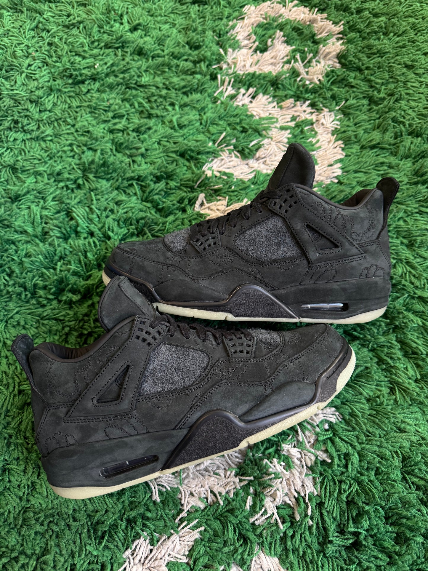 Jordan 4 x Kaws “Black”