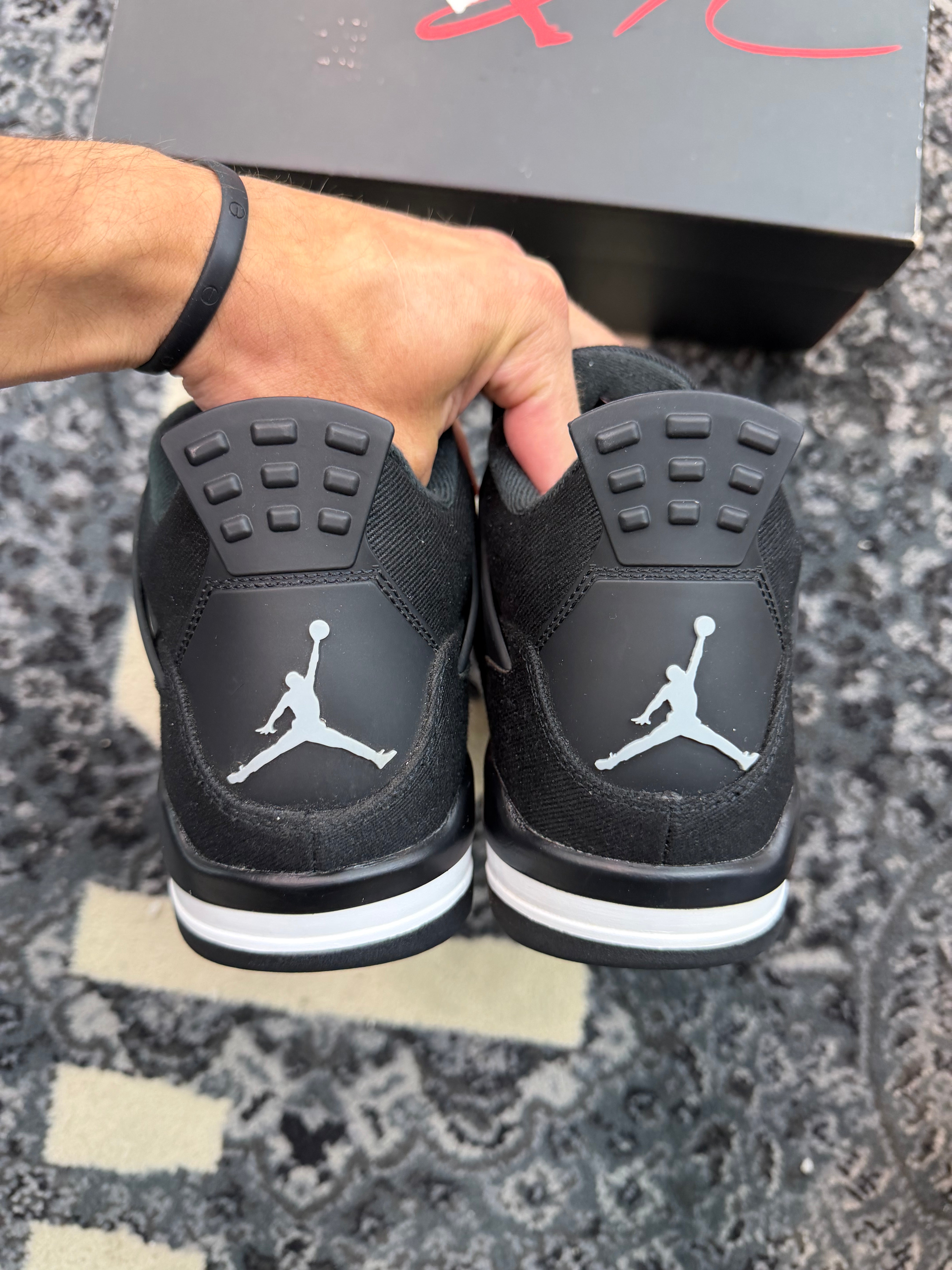 Jordan 4 “Black Canvas”