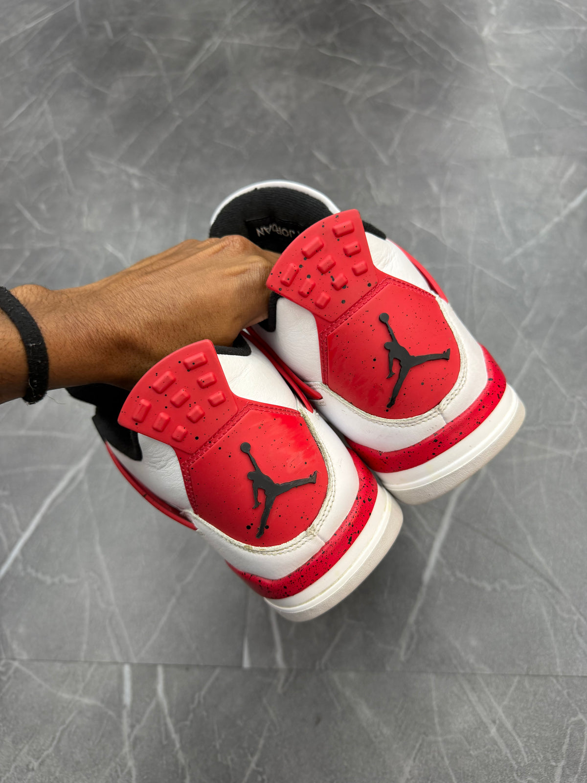 Jordan 4 “Red Cement”