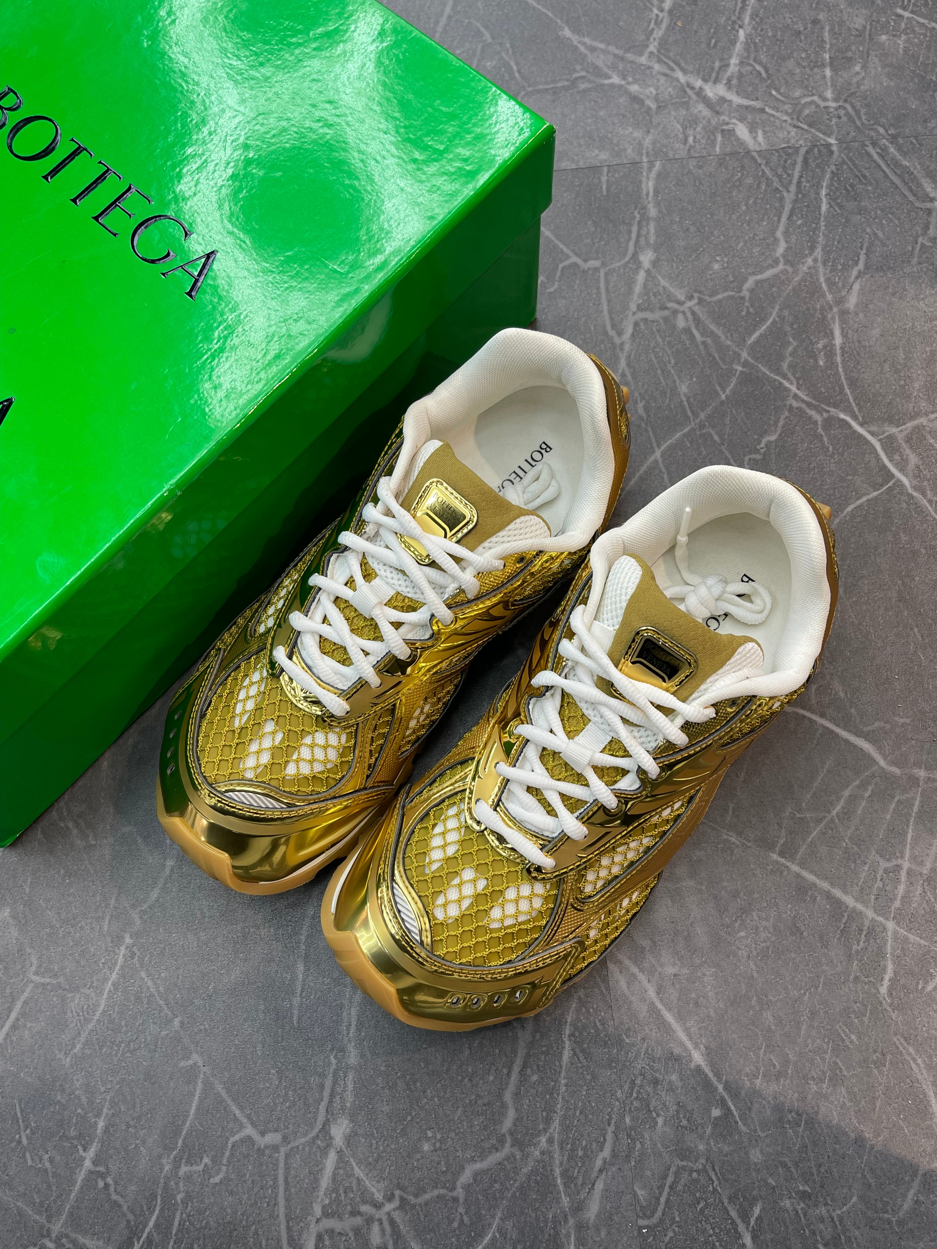 Bottega Veneta Orbit “Gold”