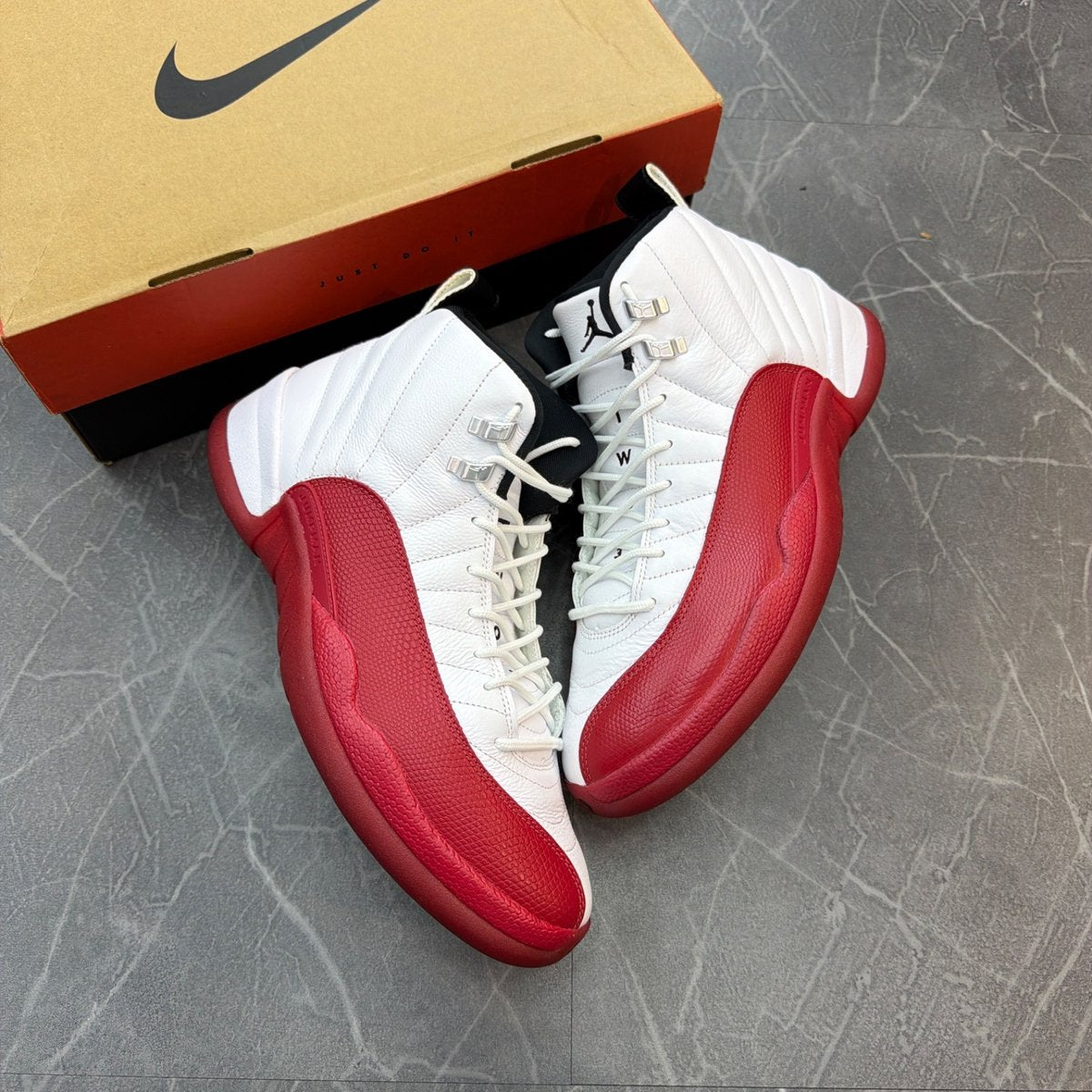 Jordan 12 Retro Cherry (2023) - Image 1
