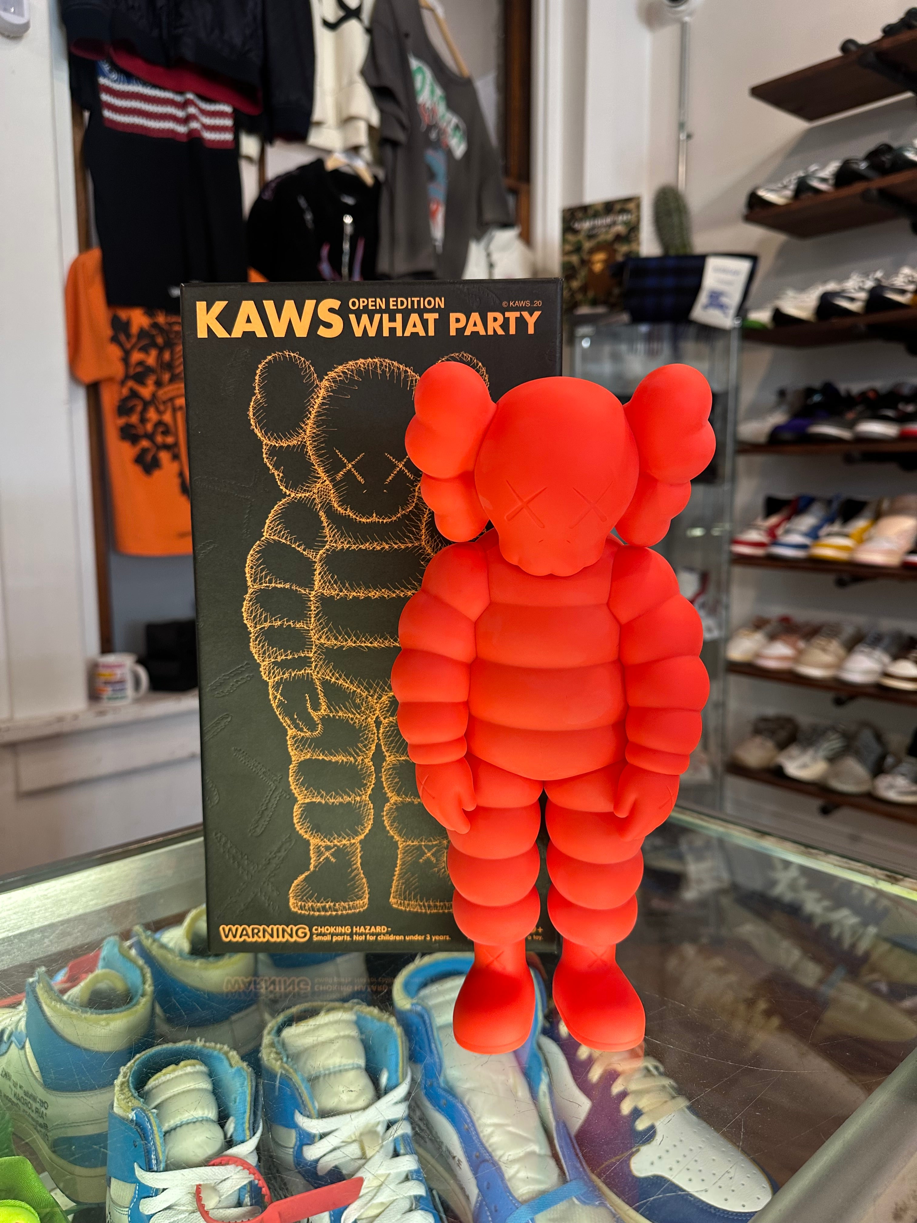 KAWS What Party Vinyl Figure “Orange”