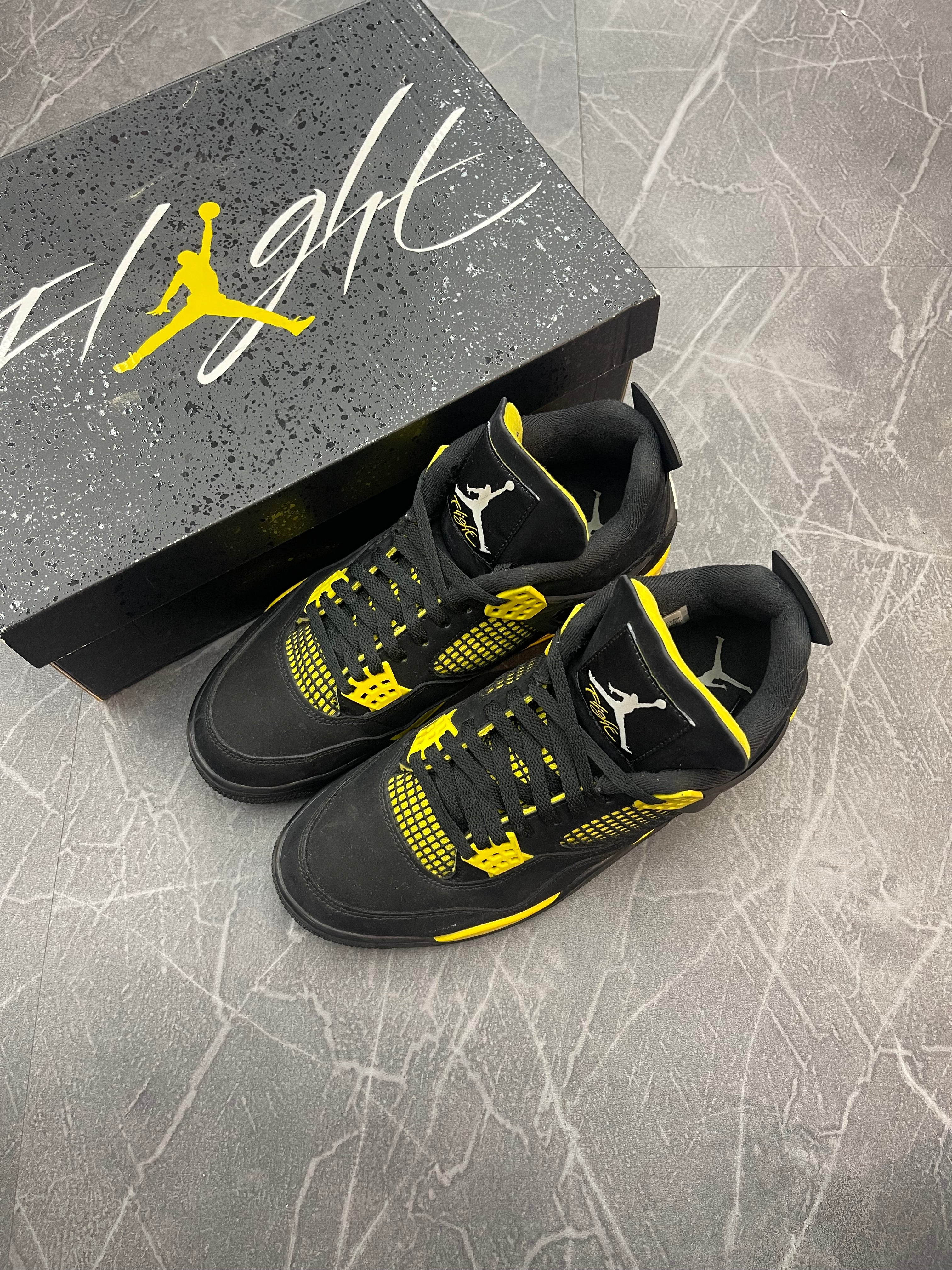 Jordan 4 “Thunder”