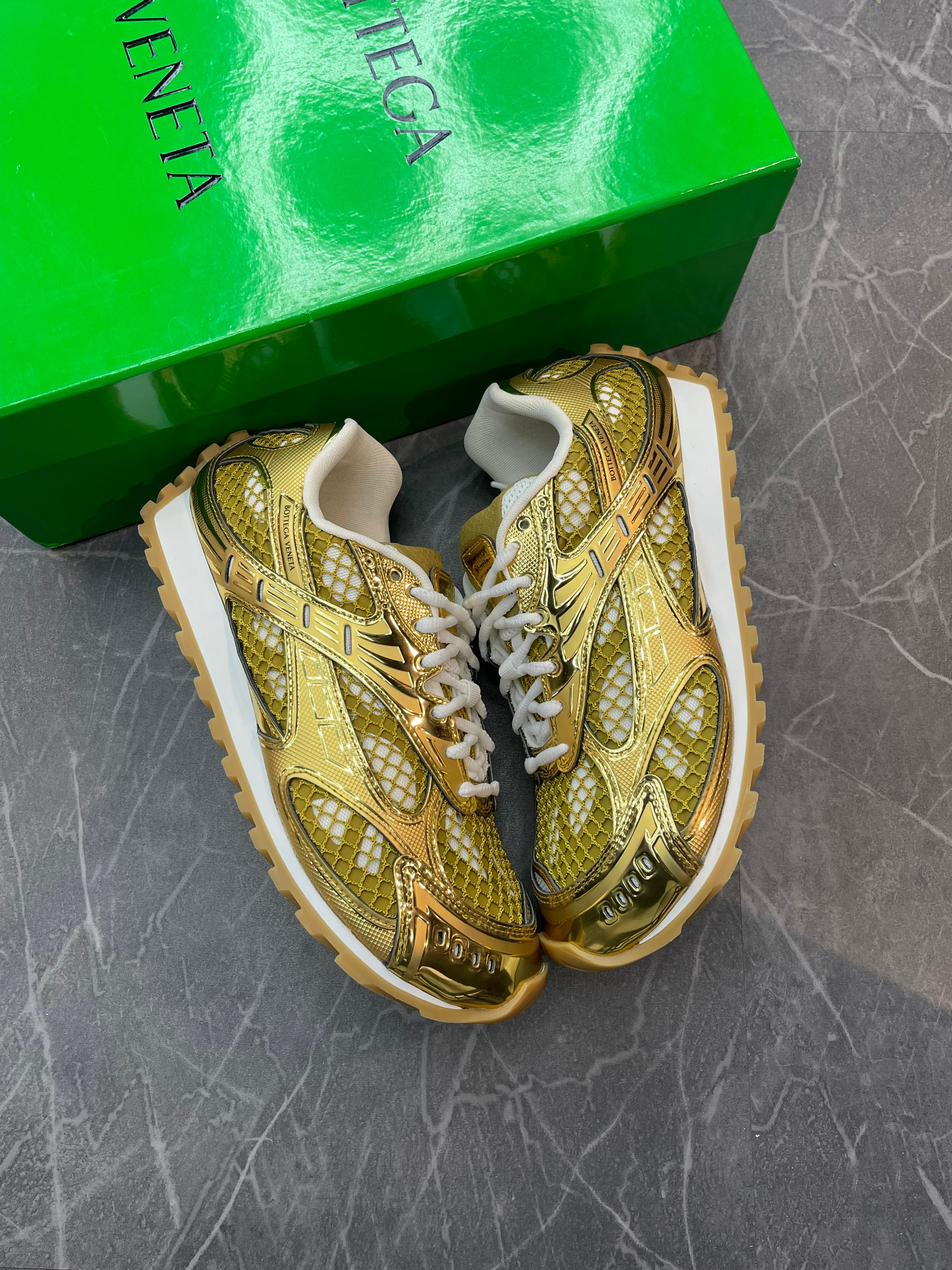 Bottega Veneta Orbit “Gold”