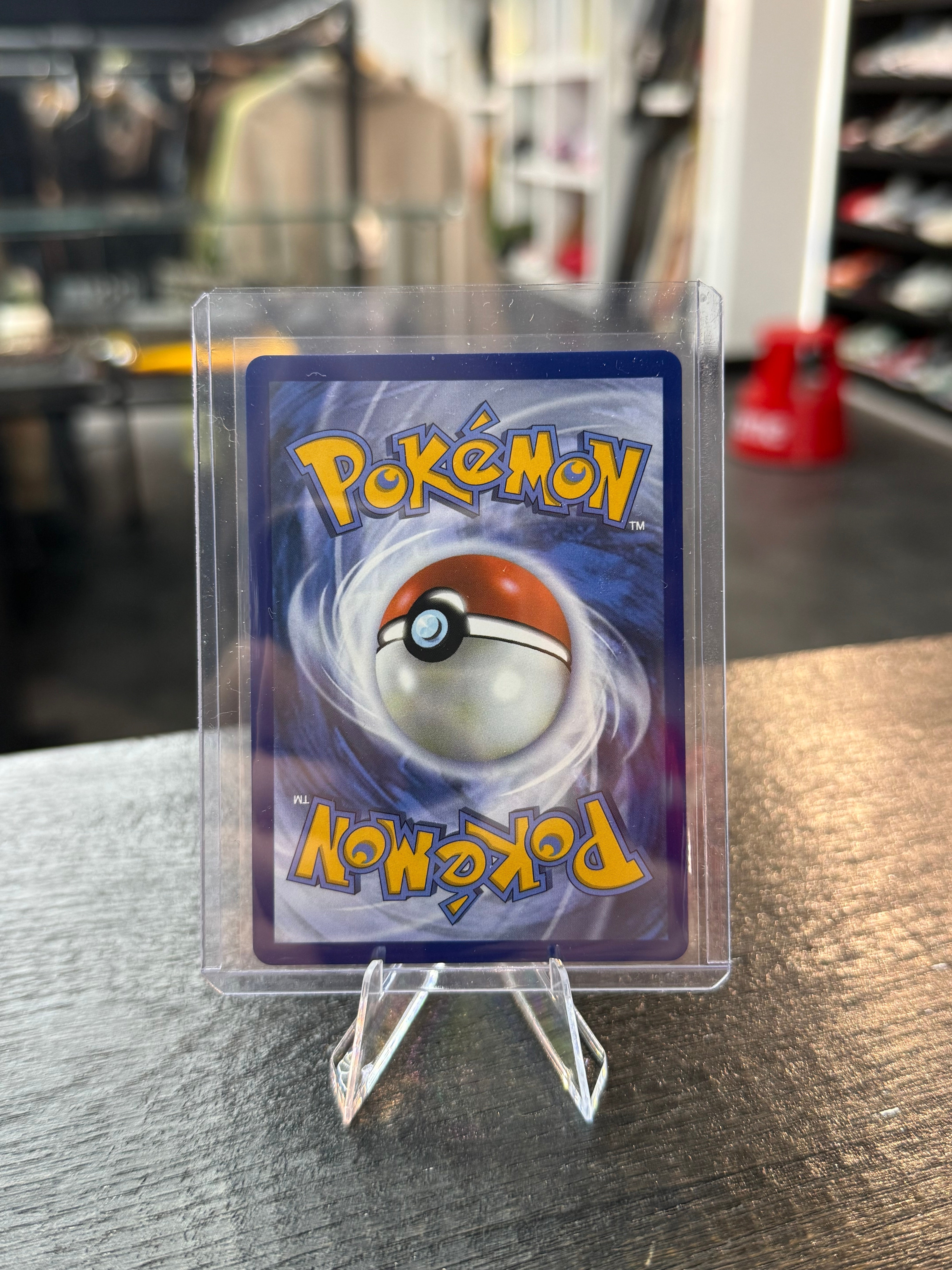 Team Rocket’s Mimikyu 238/217