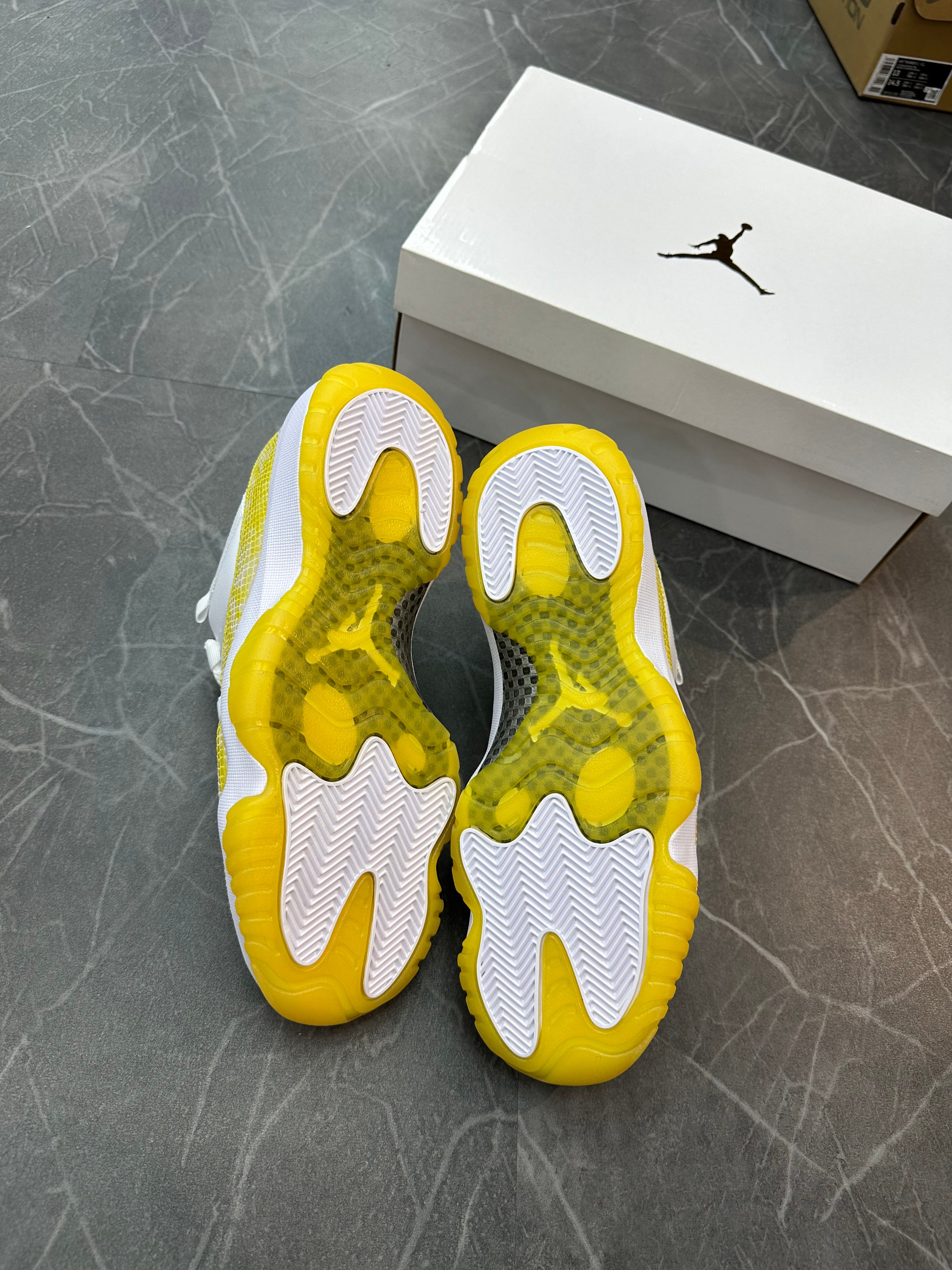 Jordan 11 Low “Yellow Snakeskin”