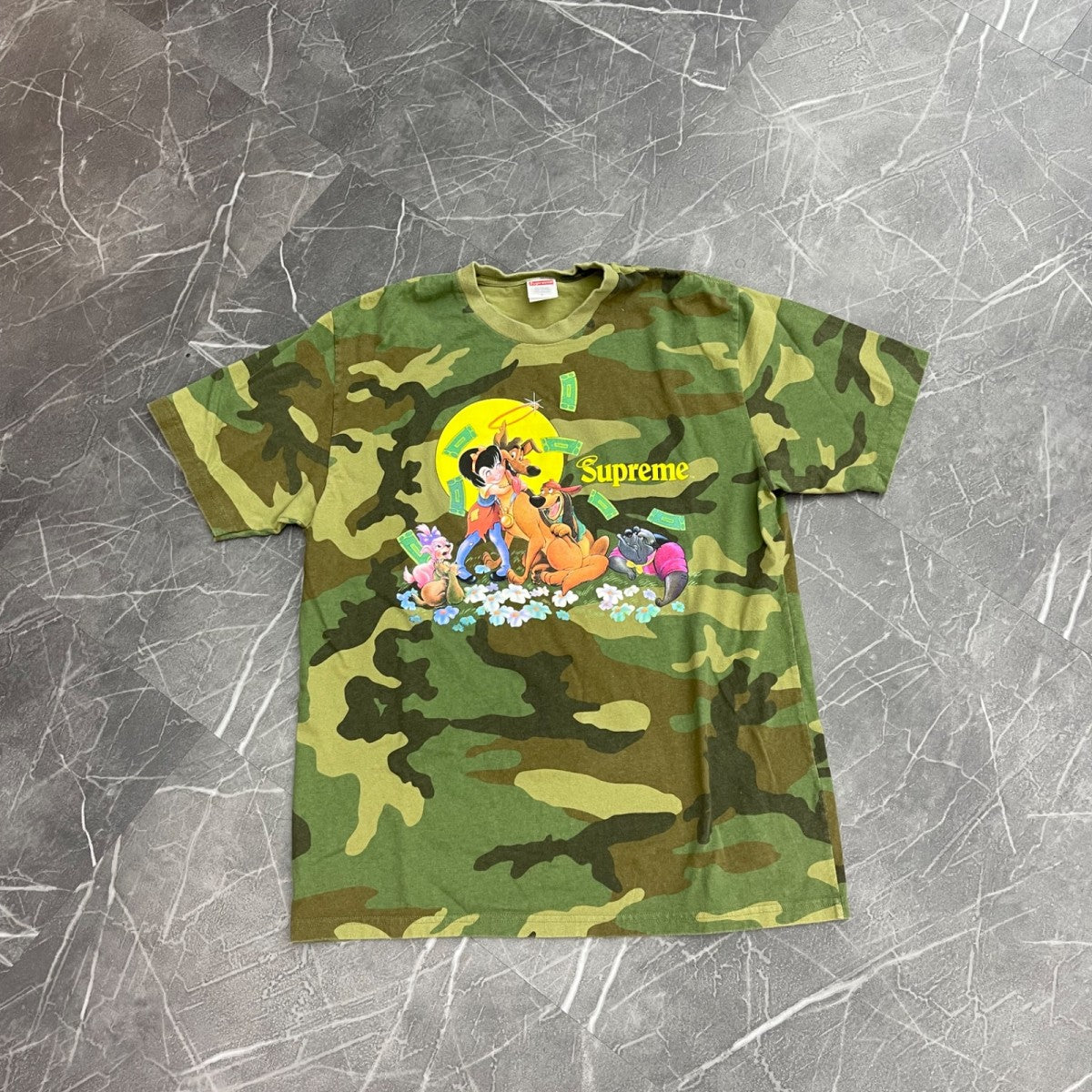 Supreme All Dogs Go To Heaven Tee Woodland Camo - Image 1