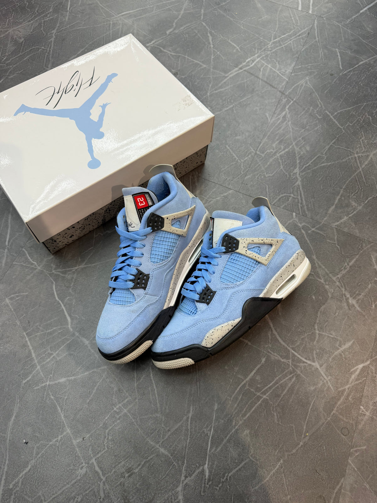 Jordan 4 “University Blue”