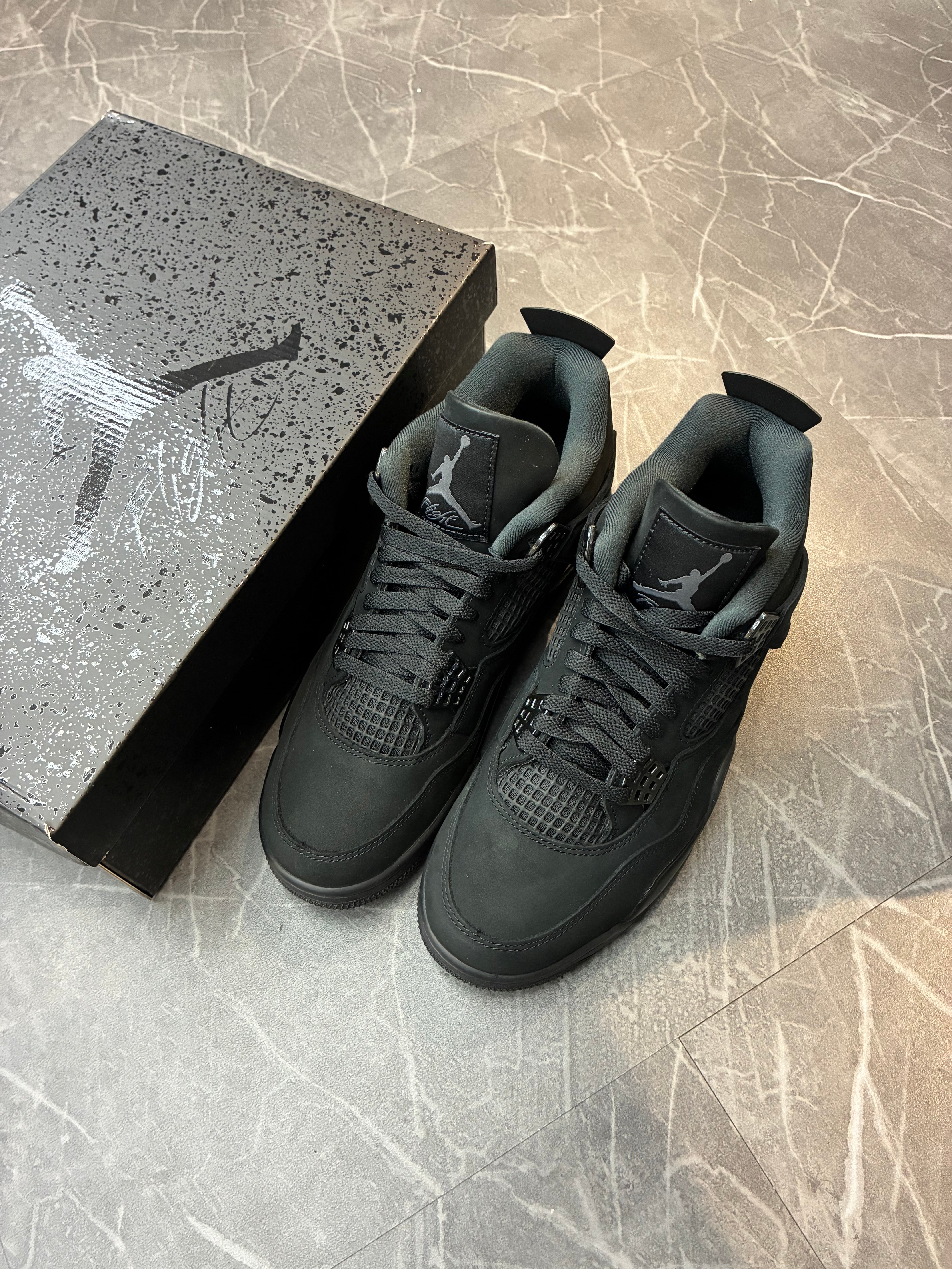 Jordan 4 “Black Cat” (2025)