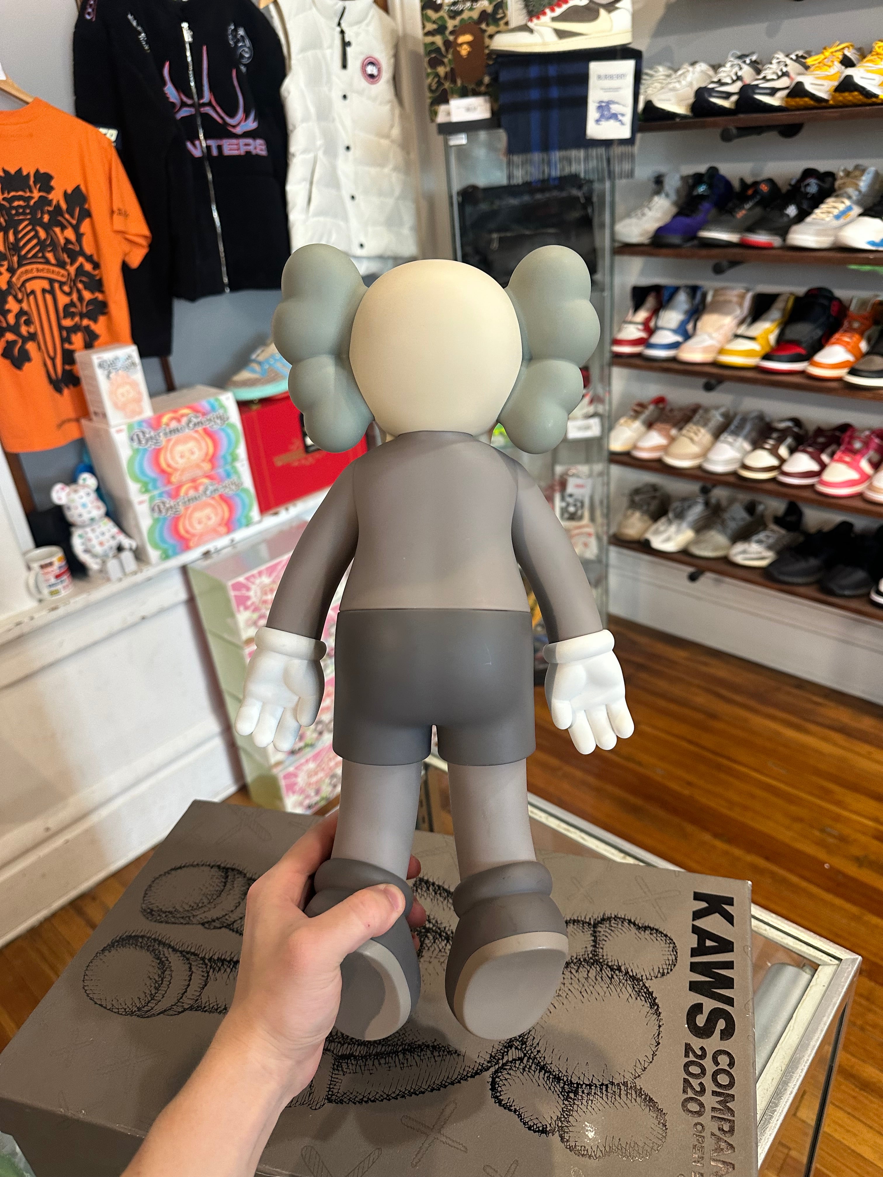 KAWS 2020 Vinyl Figure “Laying Down Brown”