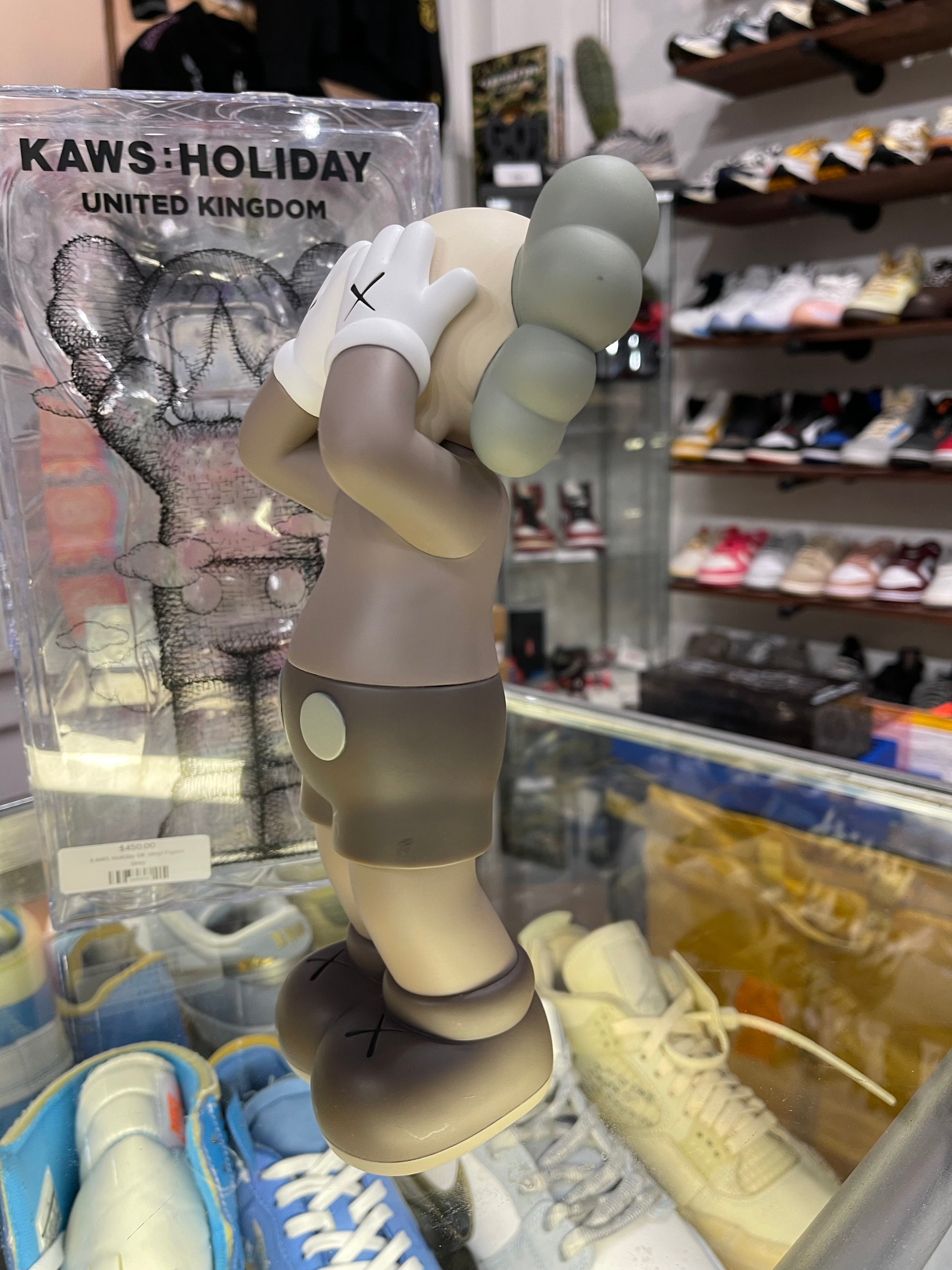 Kaws Holiday UK Vinyl Figure “Brown”