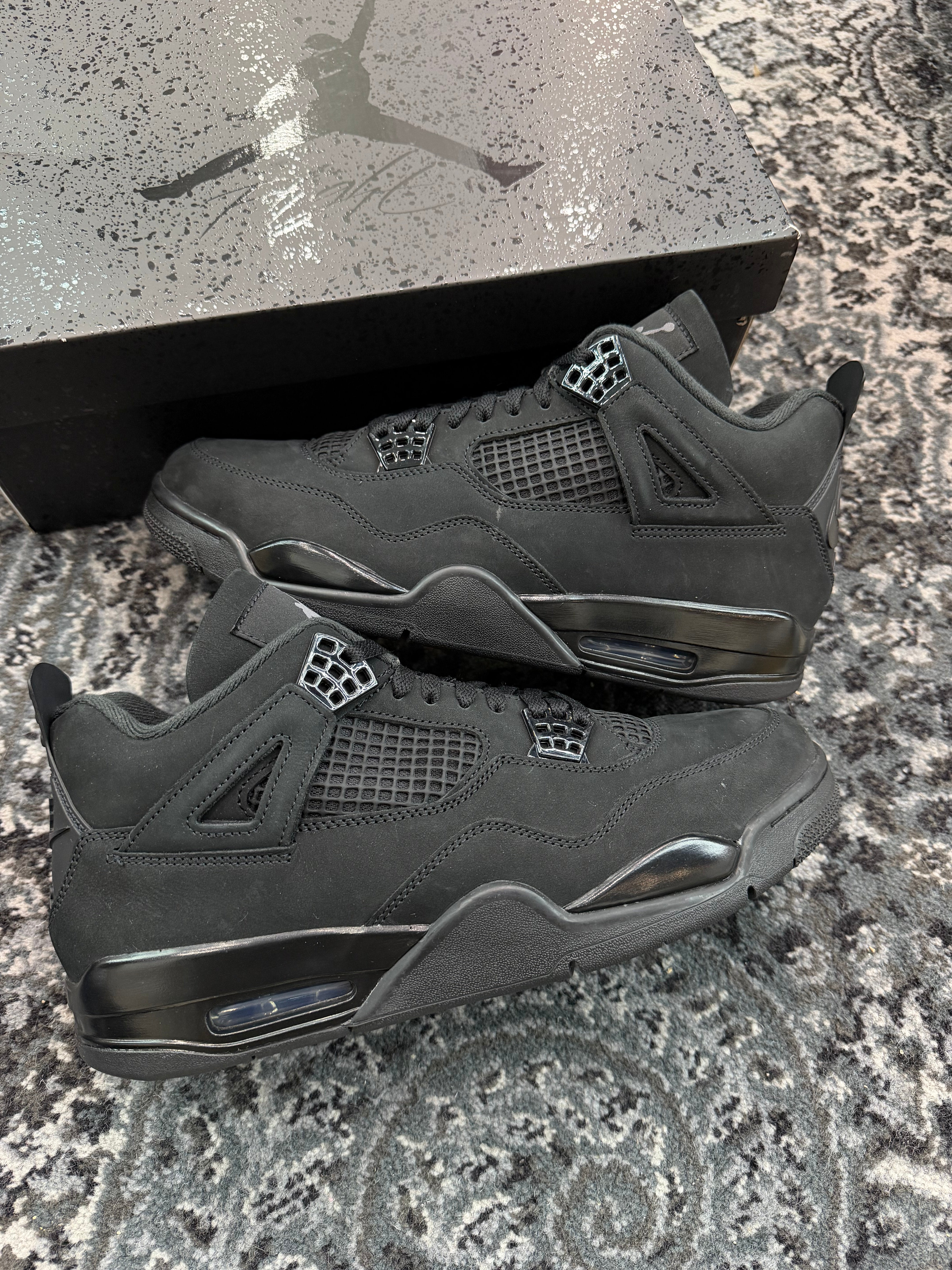 Jordan 4 “Black Cat” (2025)