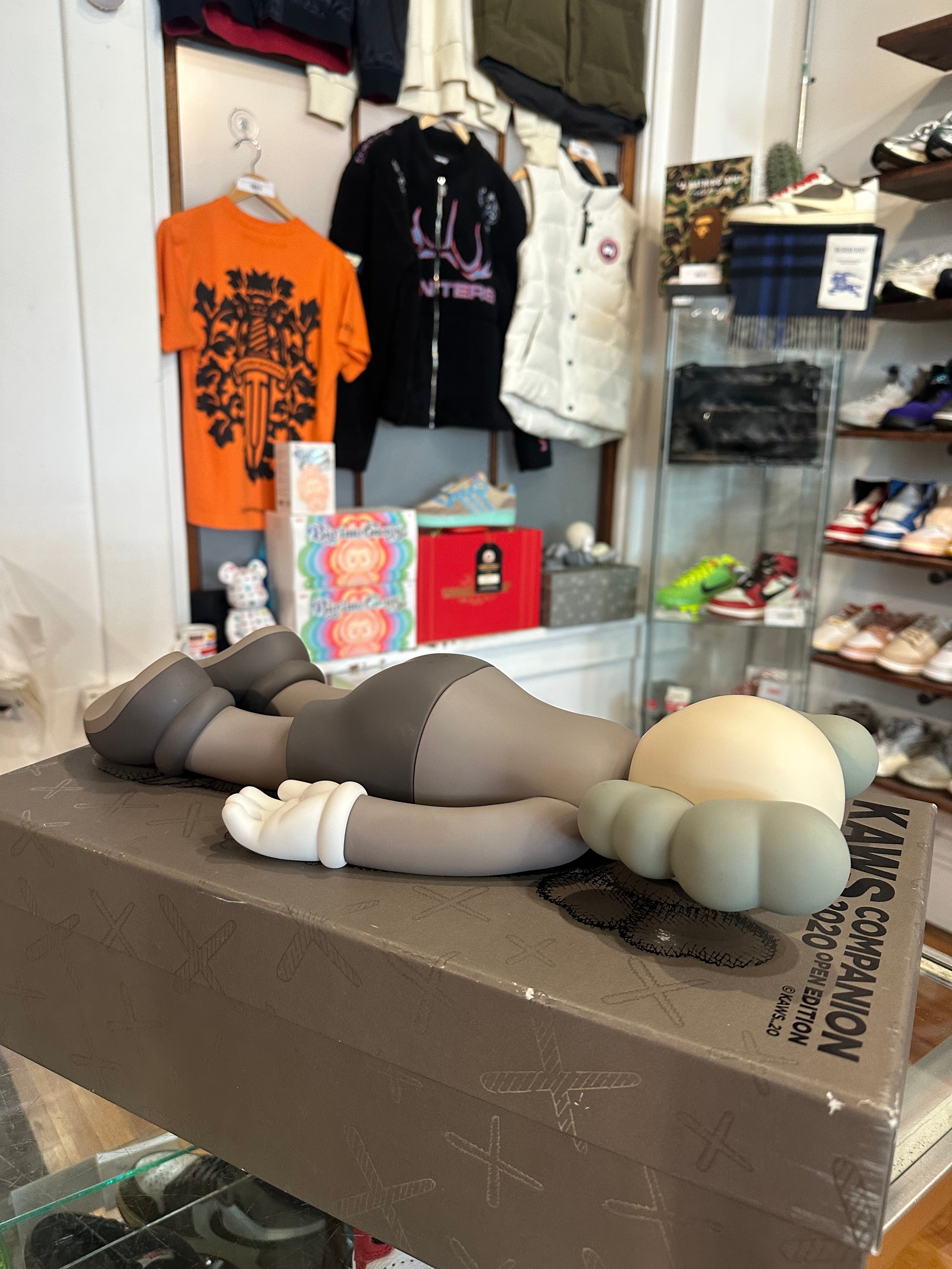 KAWS 2020 Vinyl Figure “Laying Down Brown”