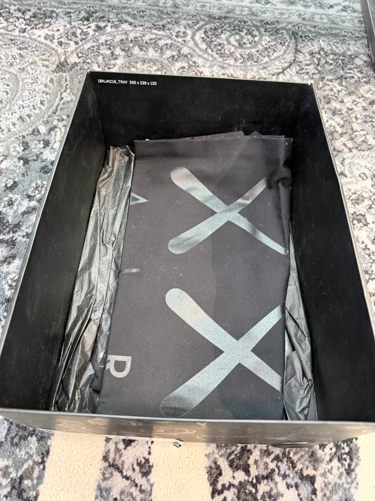 Jordan 4 x Kaws “Black”