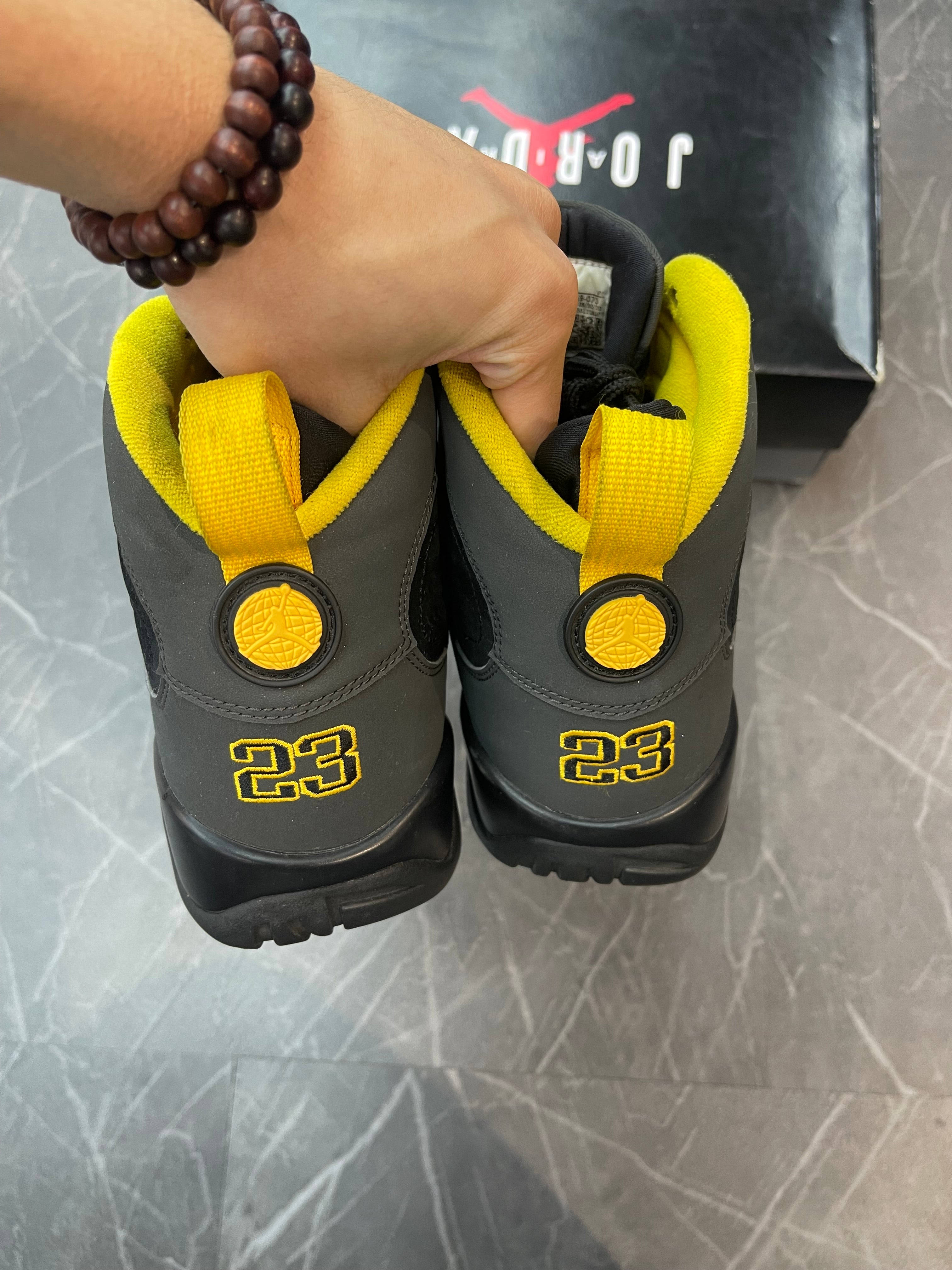 Jordan 9 “Dark Charcoal University Gold”