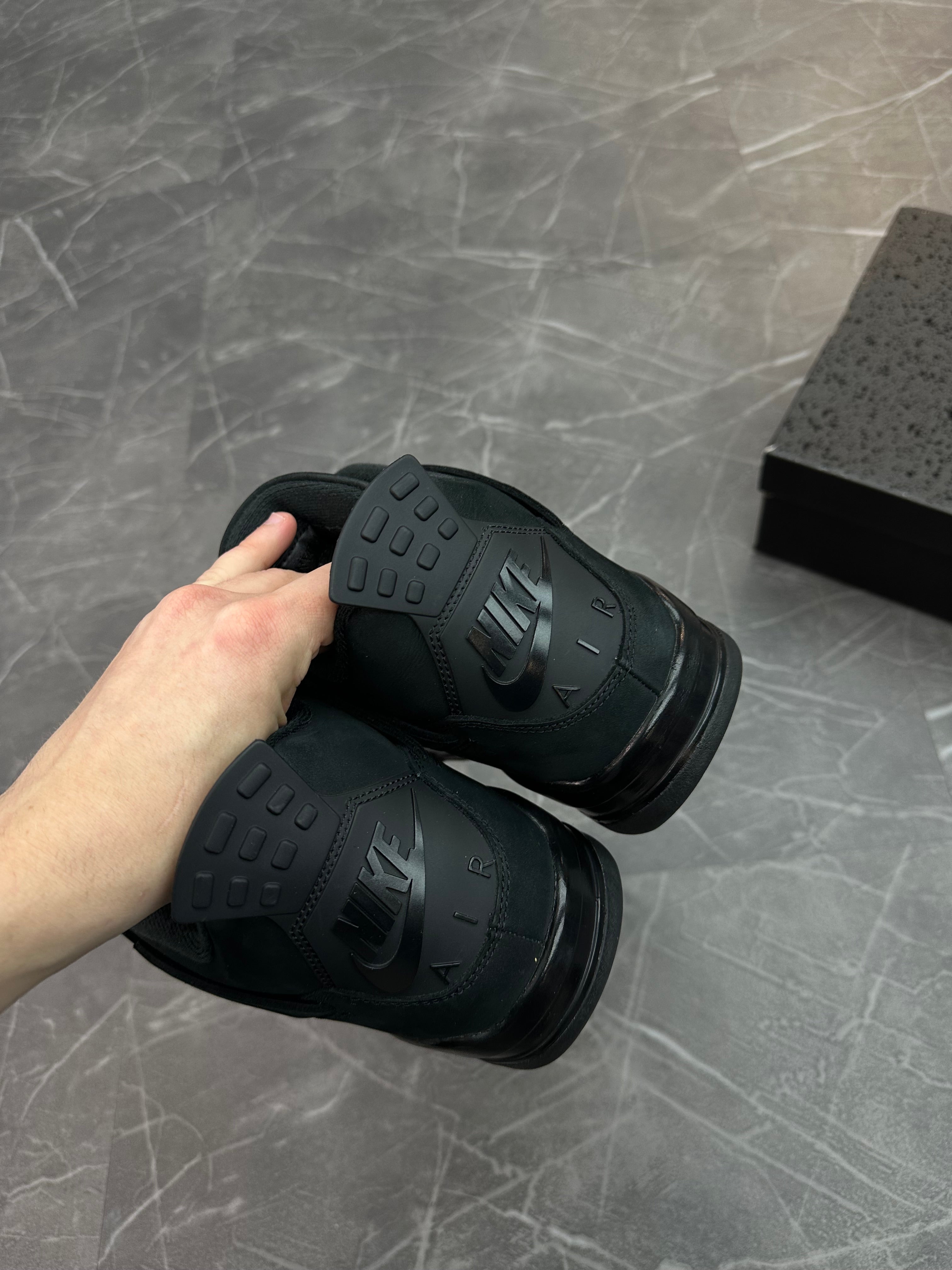 Jordan 4 “Black Cat” (2025)