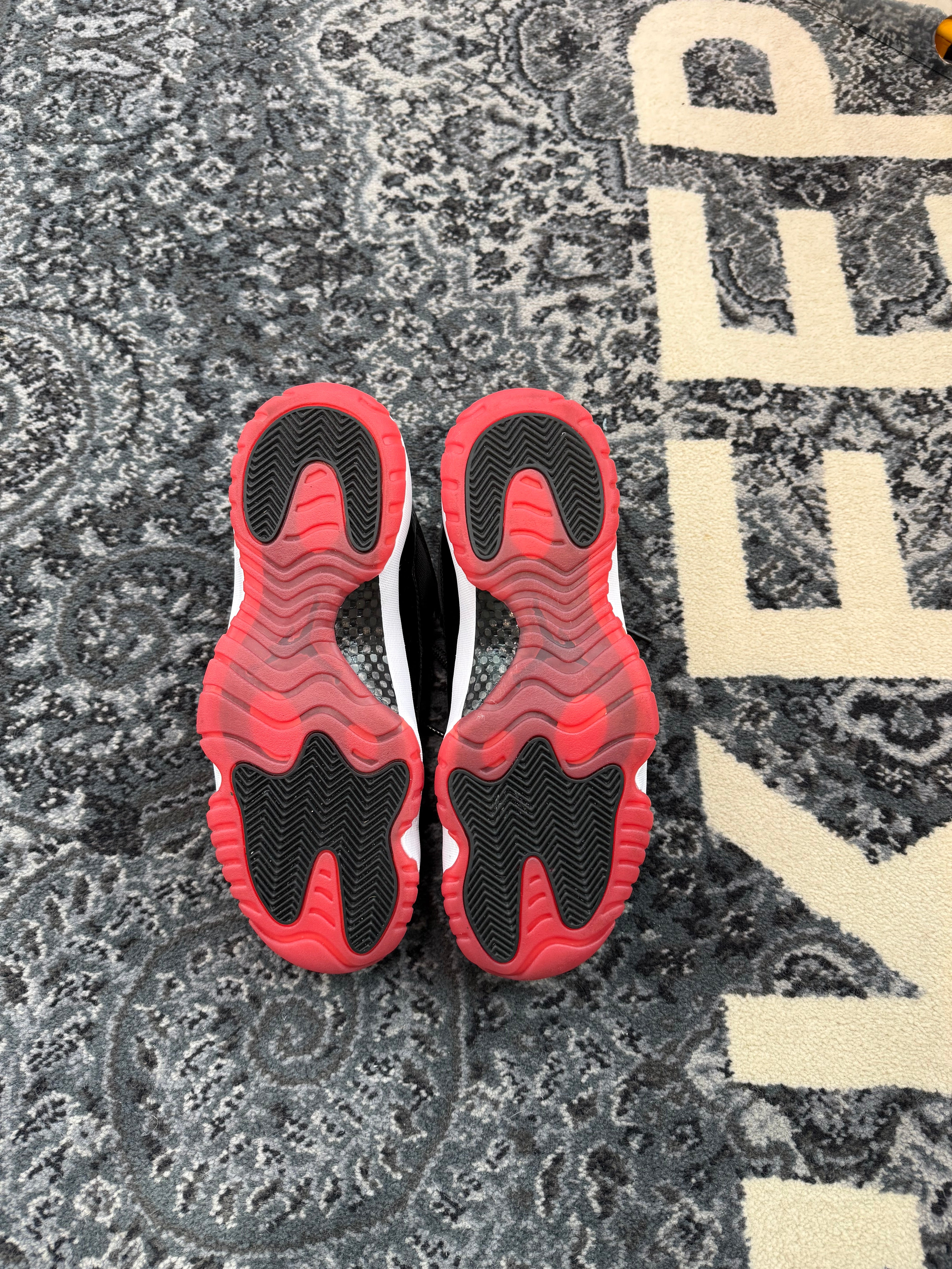 Jordan 11 Low “Bred”