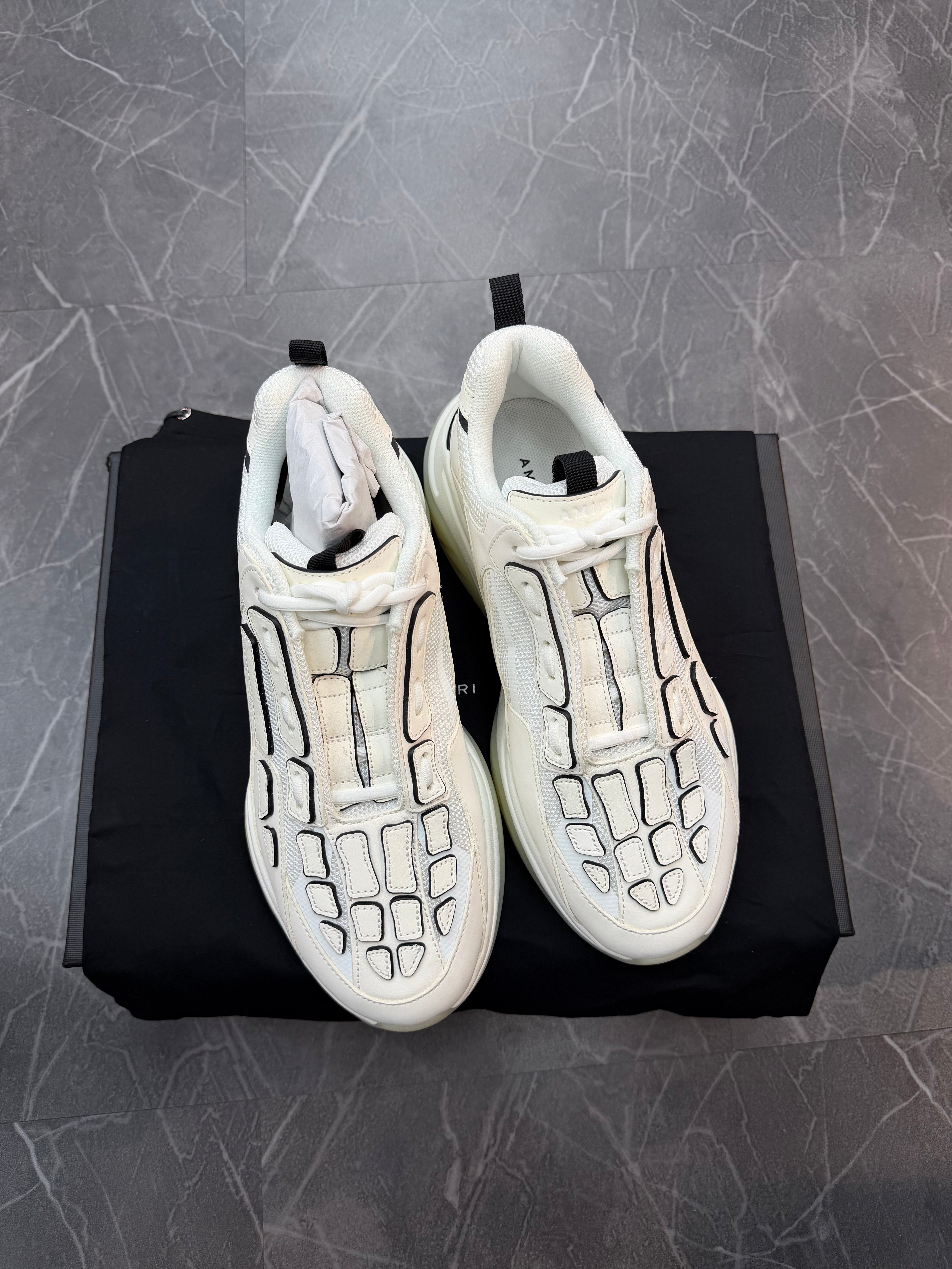 Amiri SS22 Bone Runner