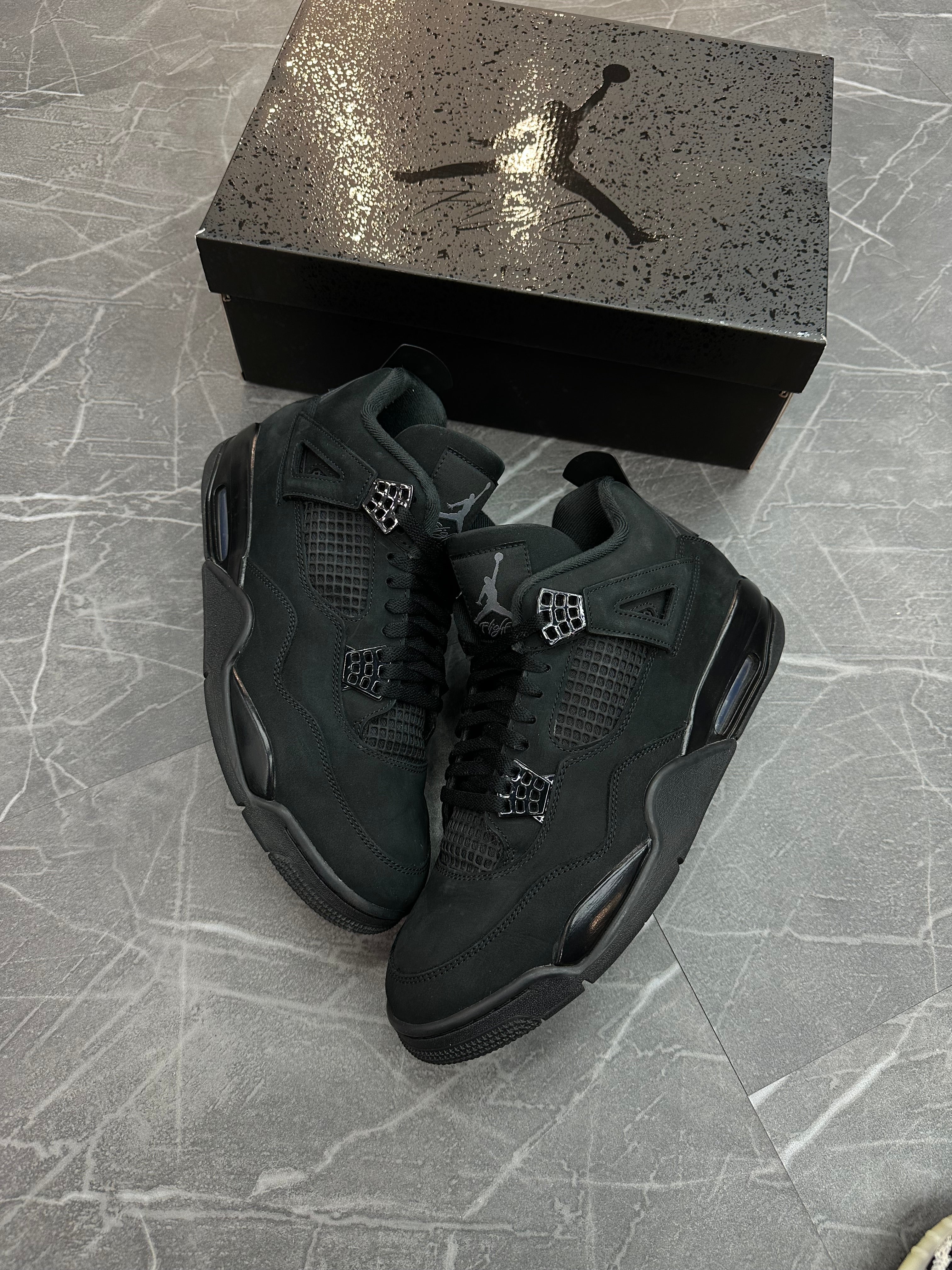 Jordan 4 “Black Cat” (2025)