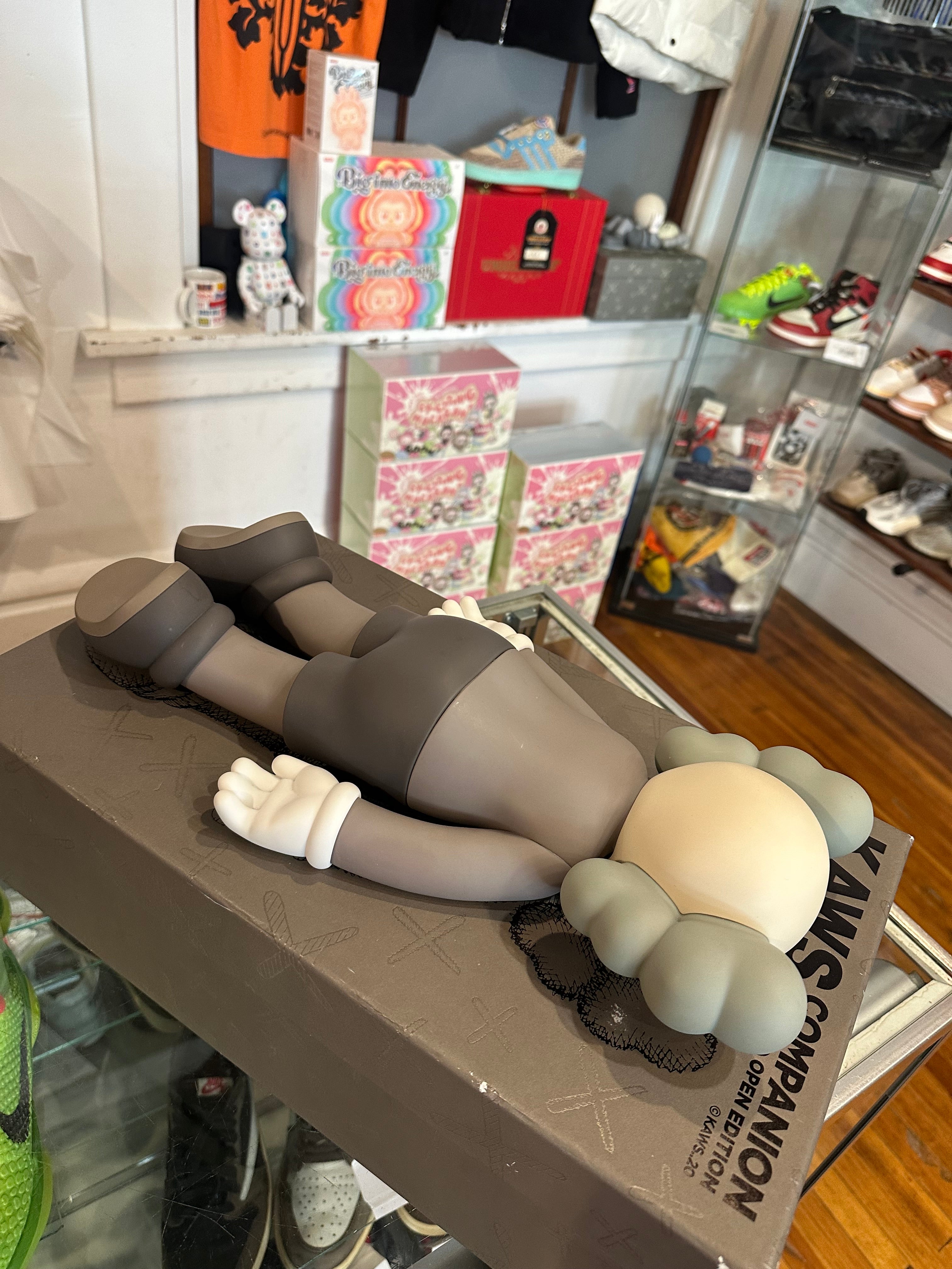 KAWS 2020 Vinyl Figure “Laying Down Brown”