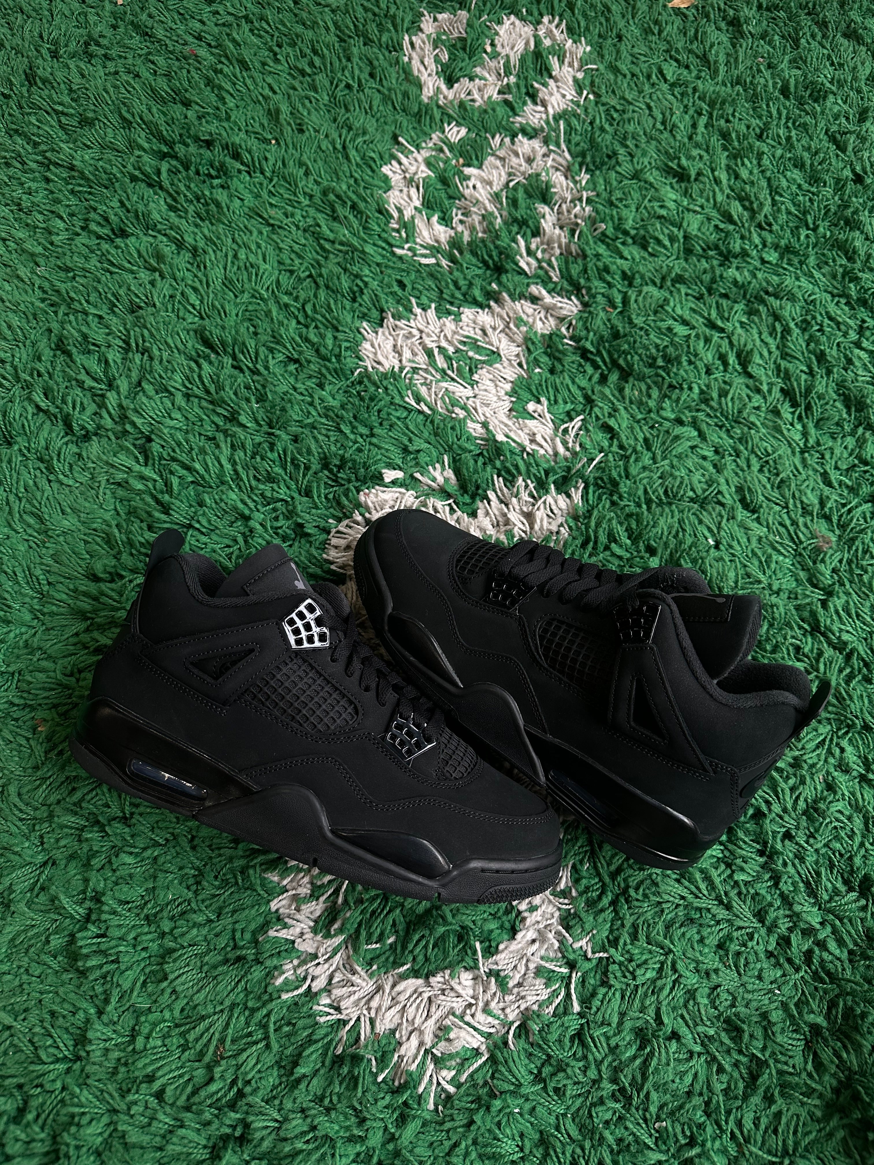 Jordan 4 “Black Cat” (2025)