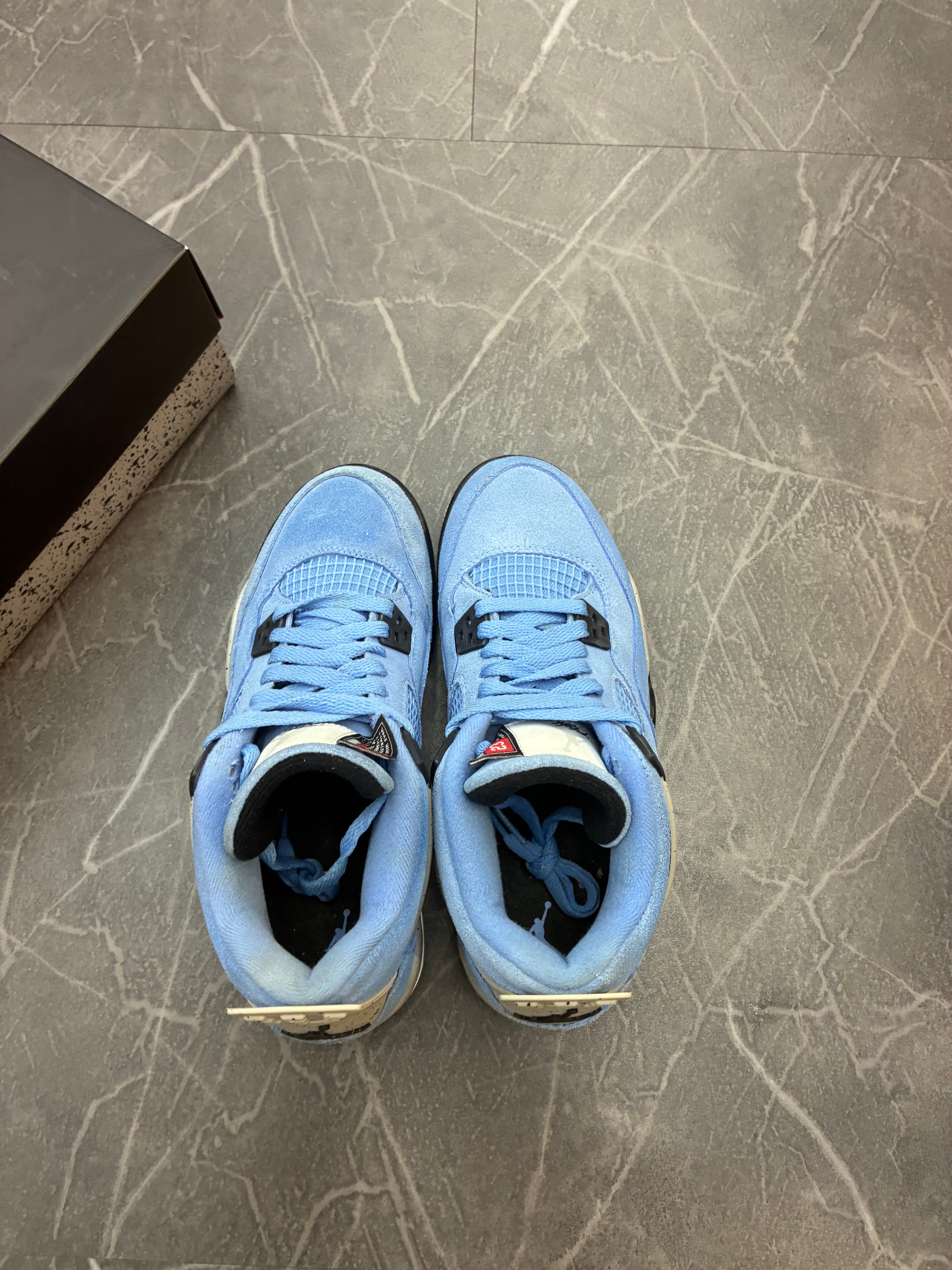 Jordan 4 “University Blue”