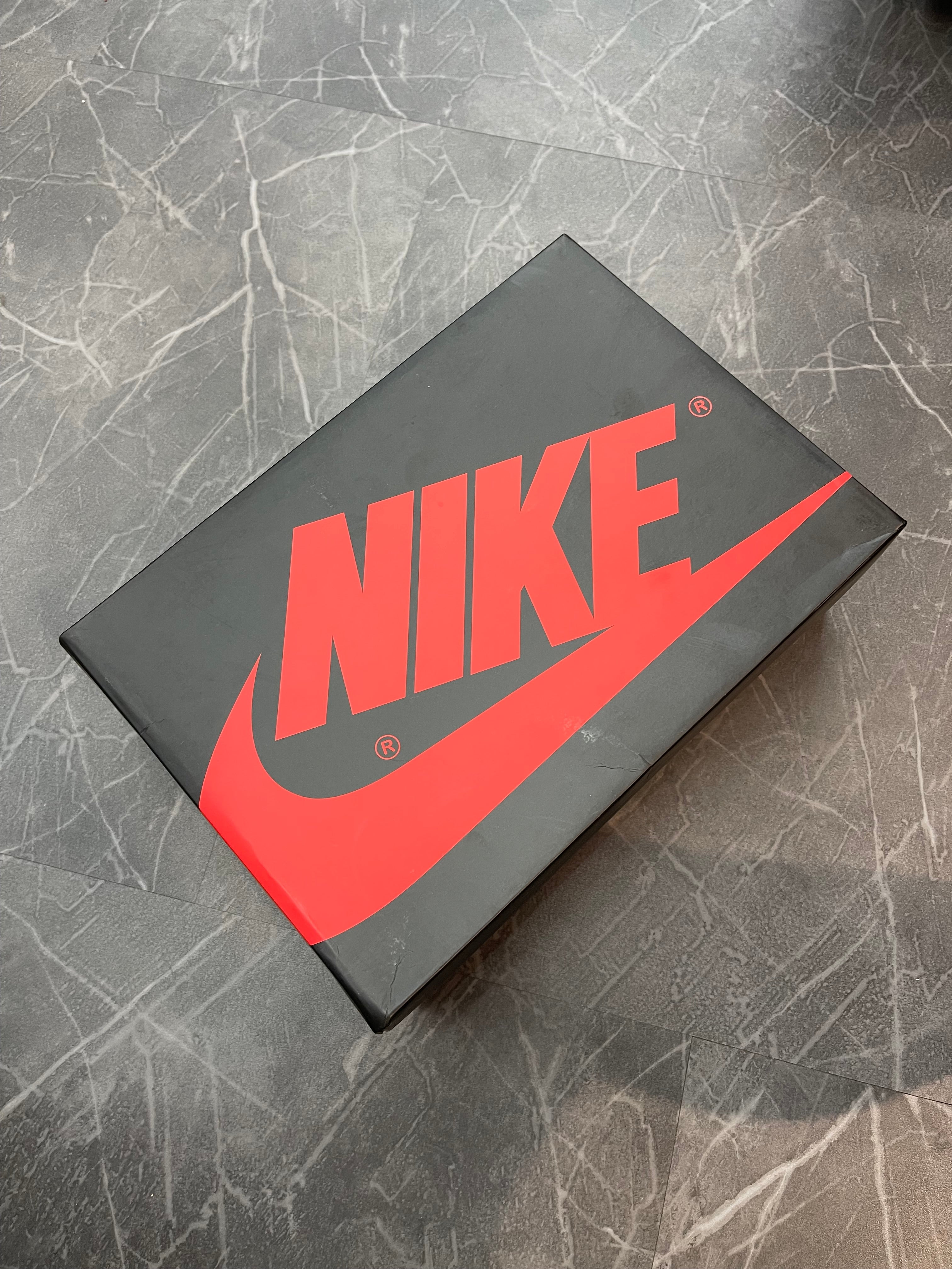 Jordan 1 Low “Black Toe”