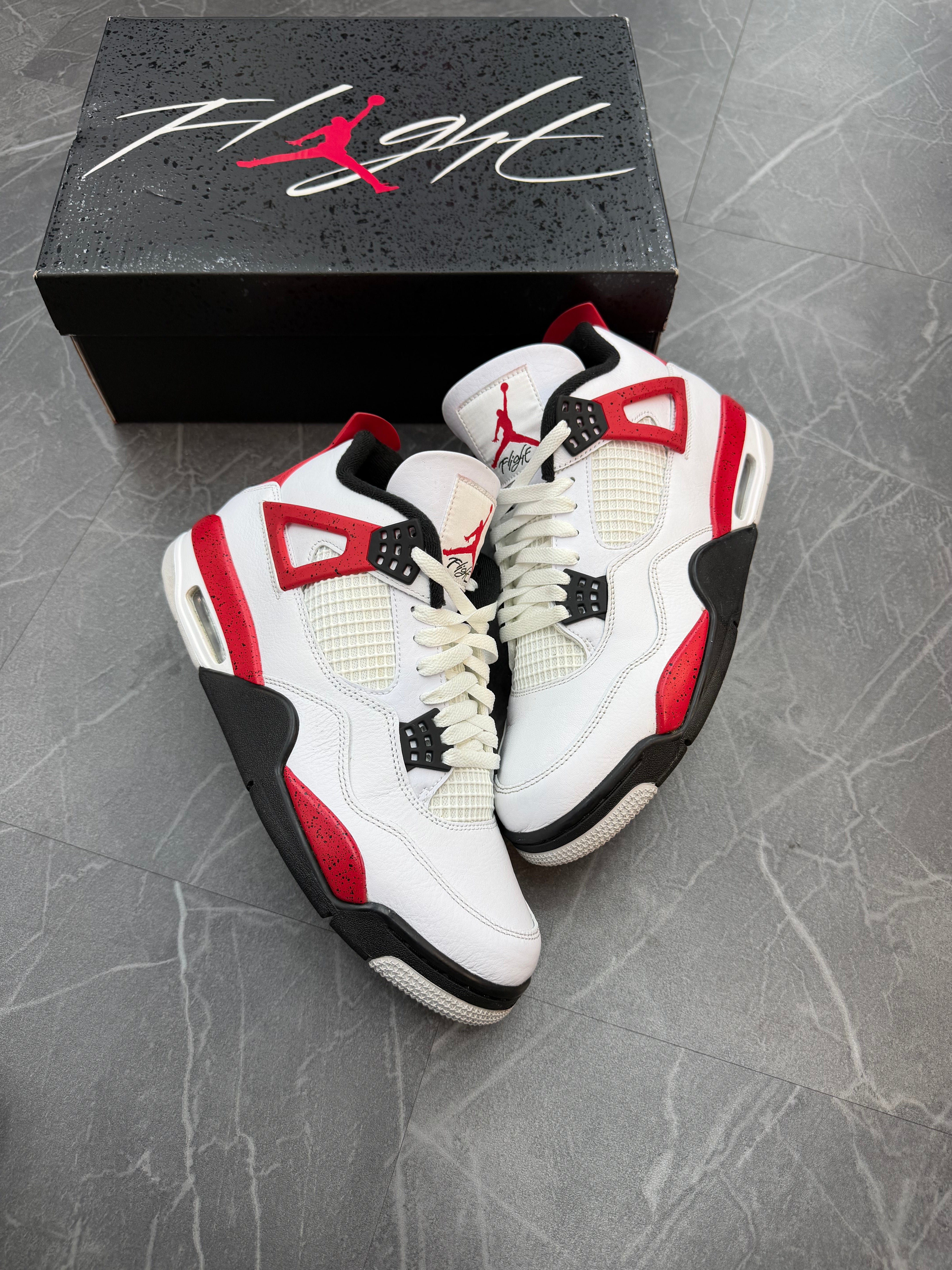 Jordan 4 “Red Cement”