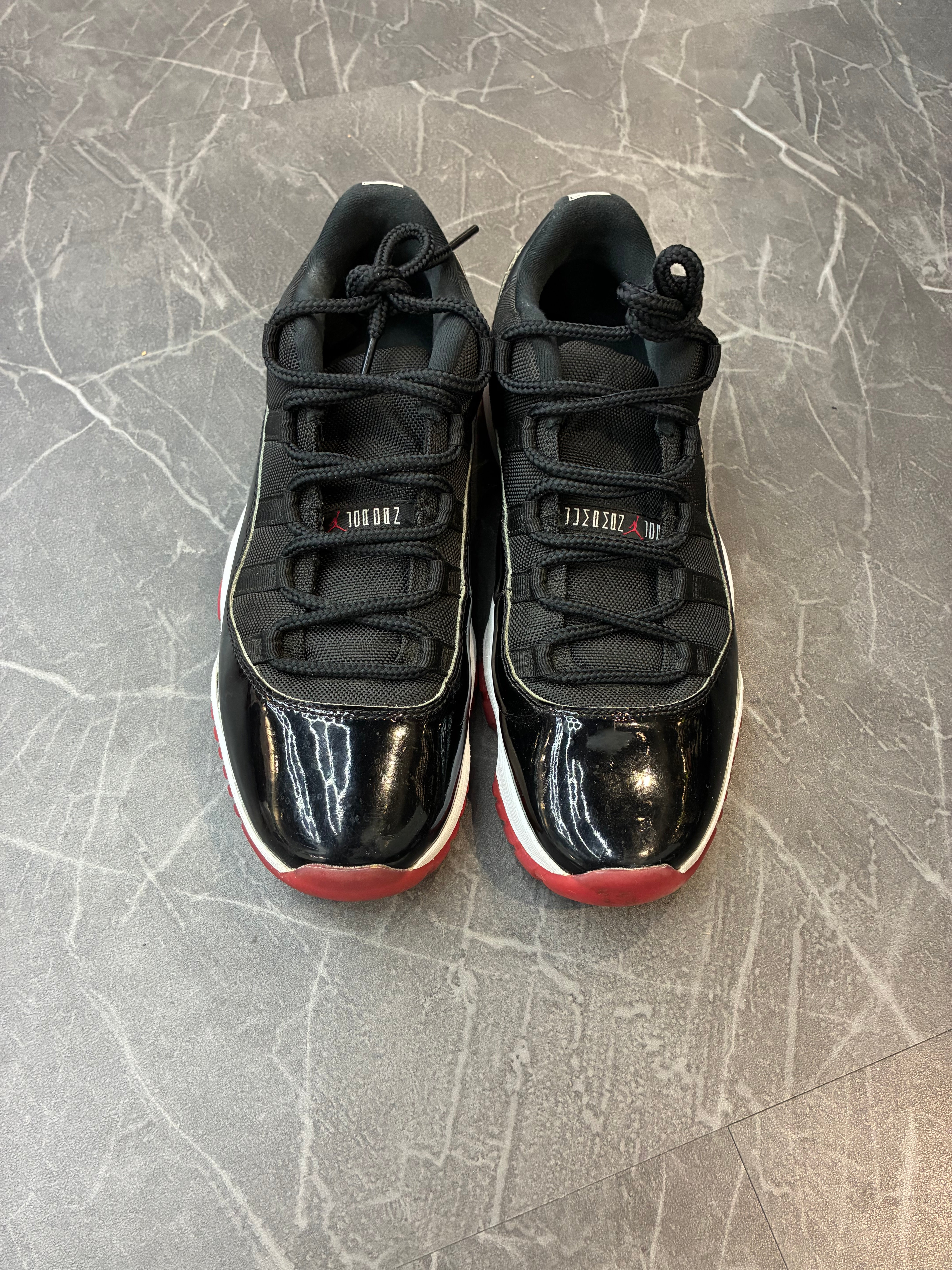 Jordan 11 Low “Bred”