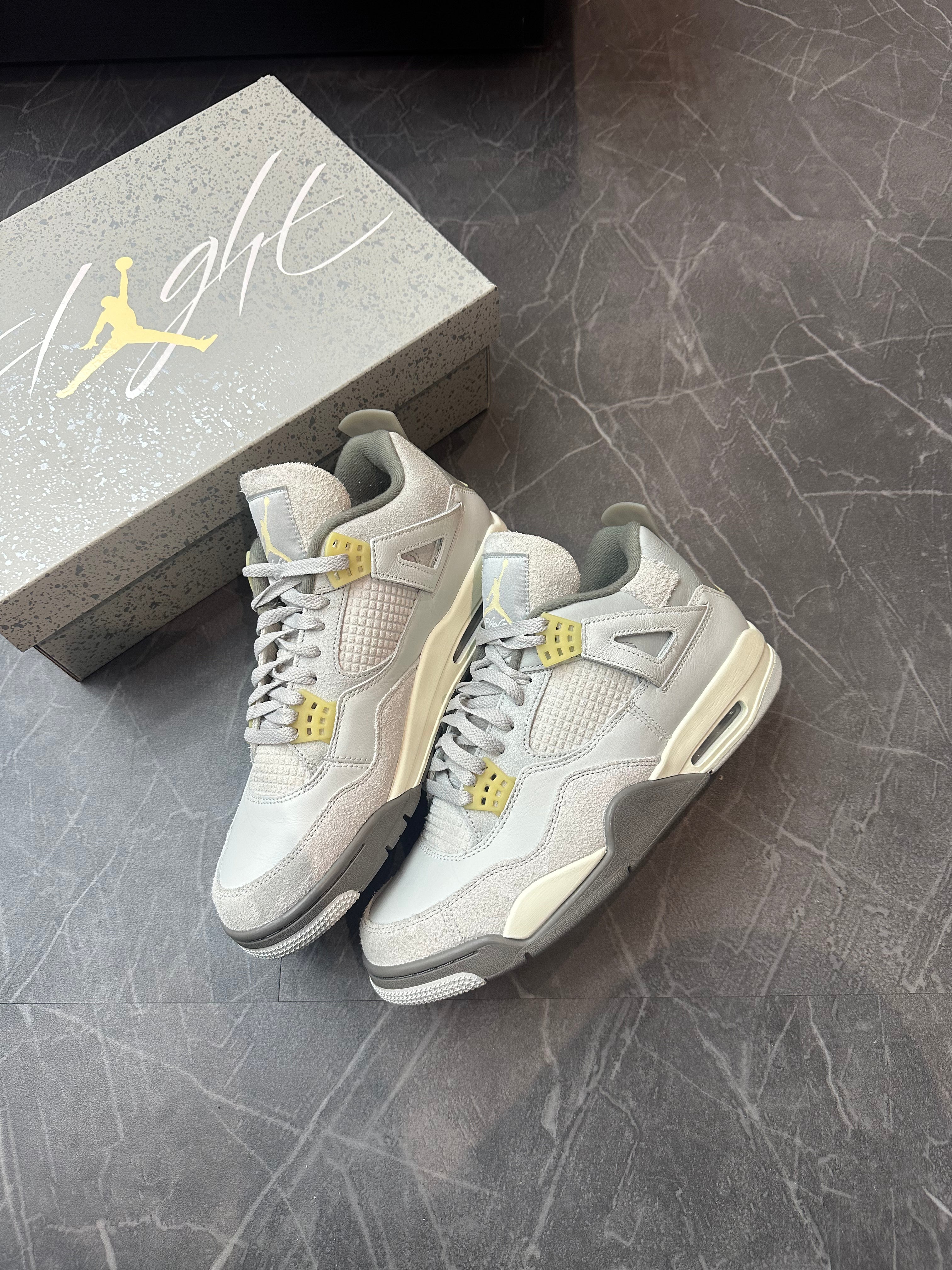 Jordan 4 “Craft Photon Dust”