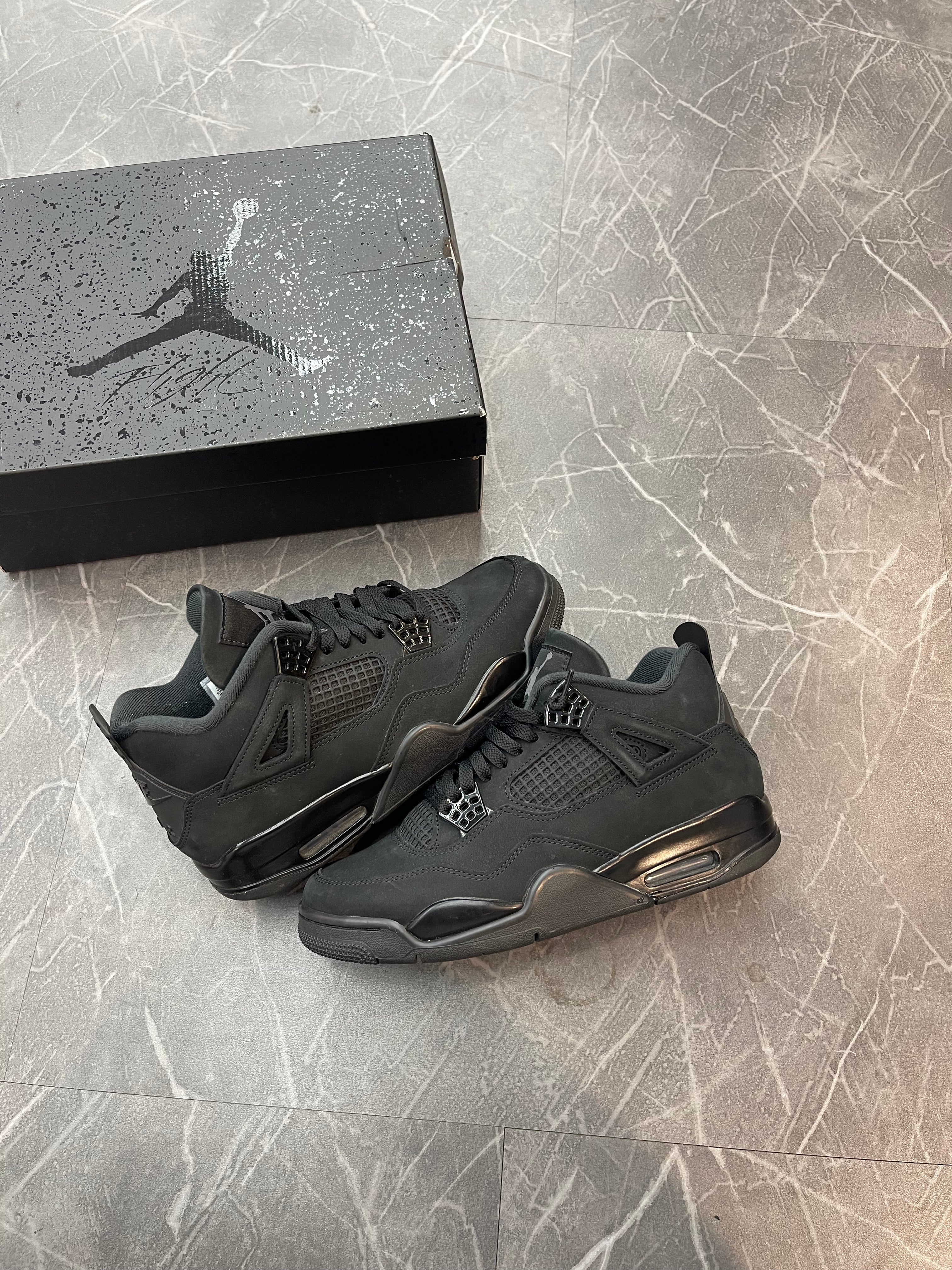 Jordan 4 “Black Cat”