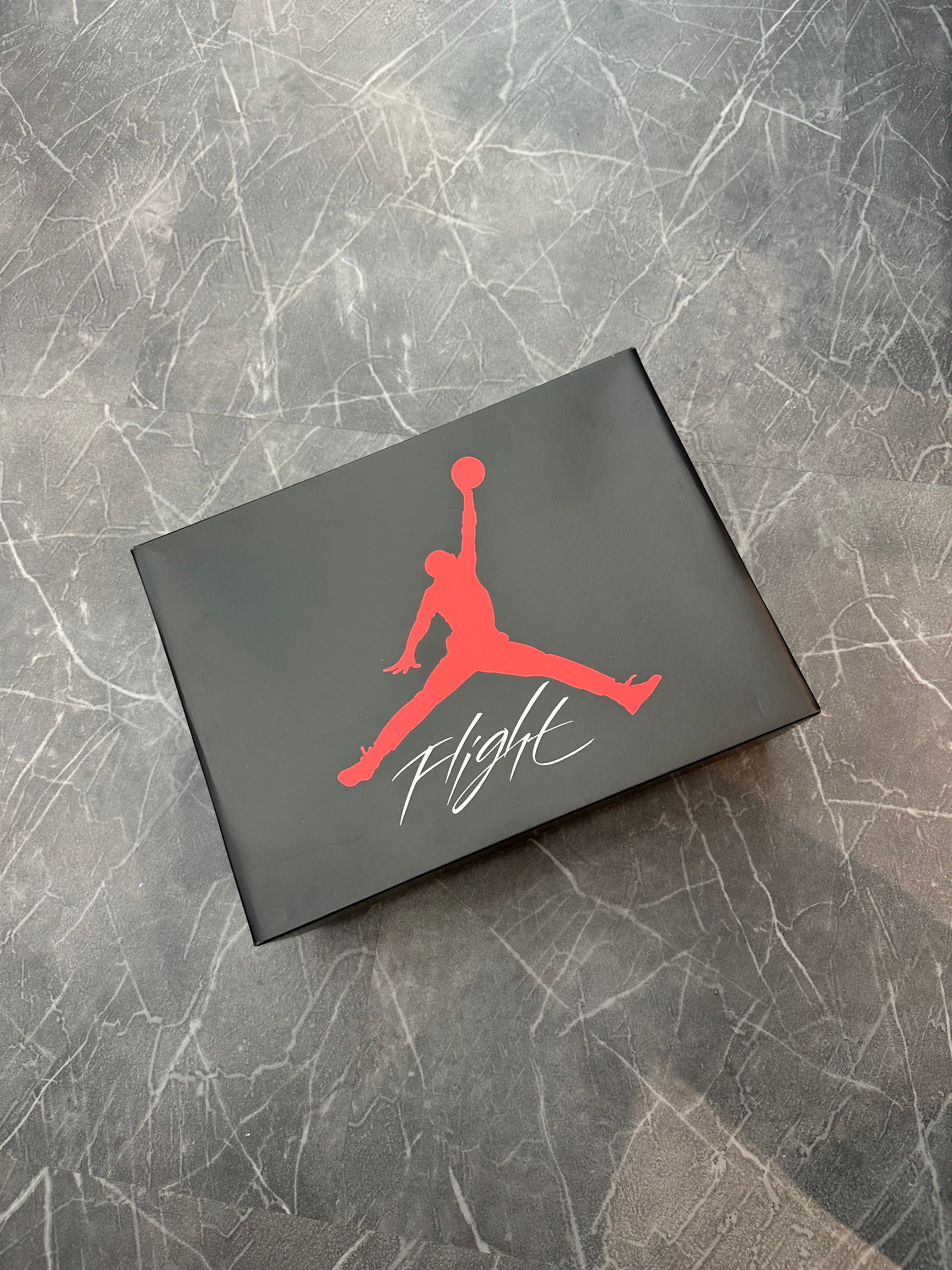 Jordan 4 “White Cement” (2025)