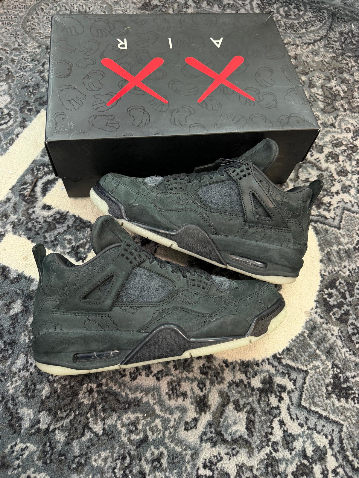 Jordan 4 x Kaws “Black”